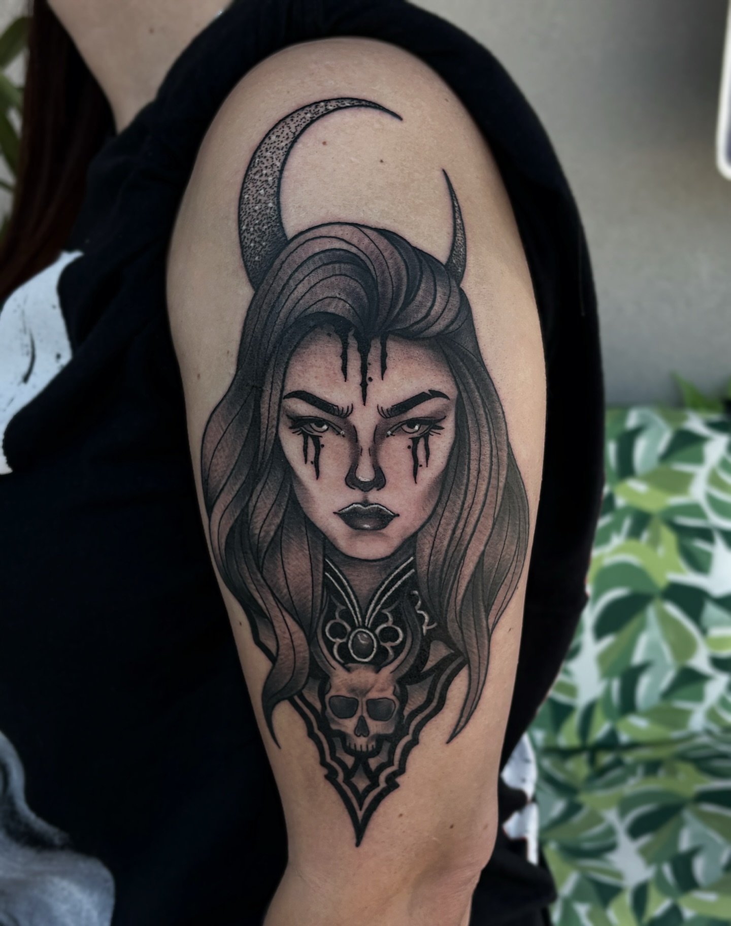 Female face with horns realism tattoo on the forearm by Bunny Noel