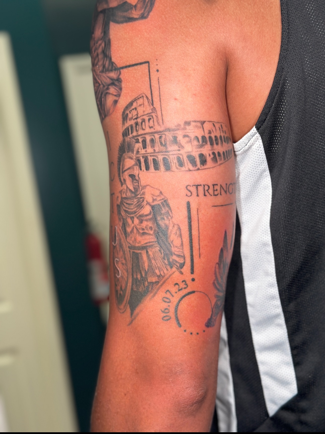 Roman warrior and colosseum realism tattoo on the forearm by Nashville Tattoo Artist - Nicolette Madlyne