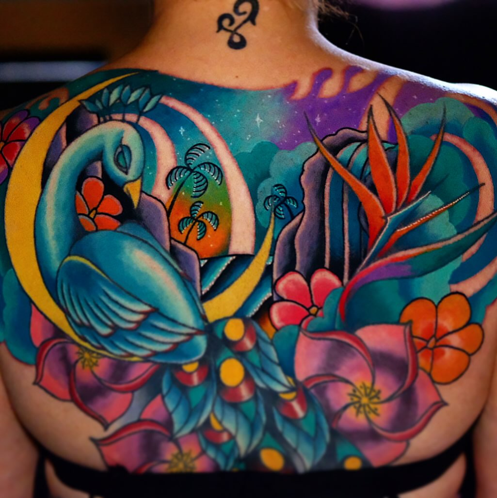 Peacock and tropical flowers new school tattoo on the back by Don Boos Tattoos