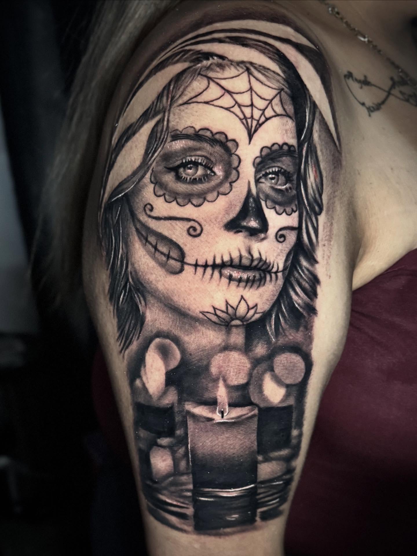 Sugar skull realism tattoo on the shoulder by Tony Garcia