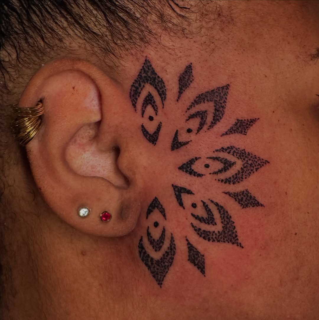 Geometric floral pattern geometric tattoo on the neck by Lisa Nikolopoulos, New York, New York