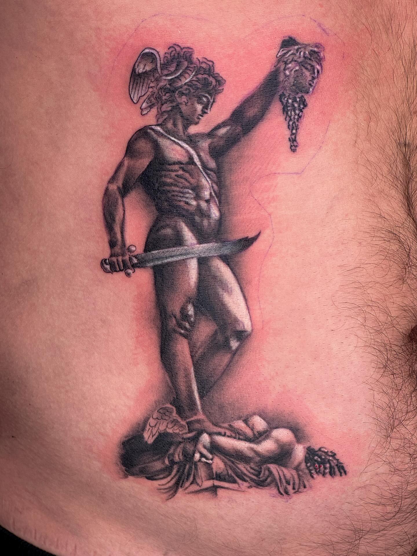 Tattoo by @aarondoestattoos — realism
