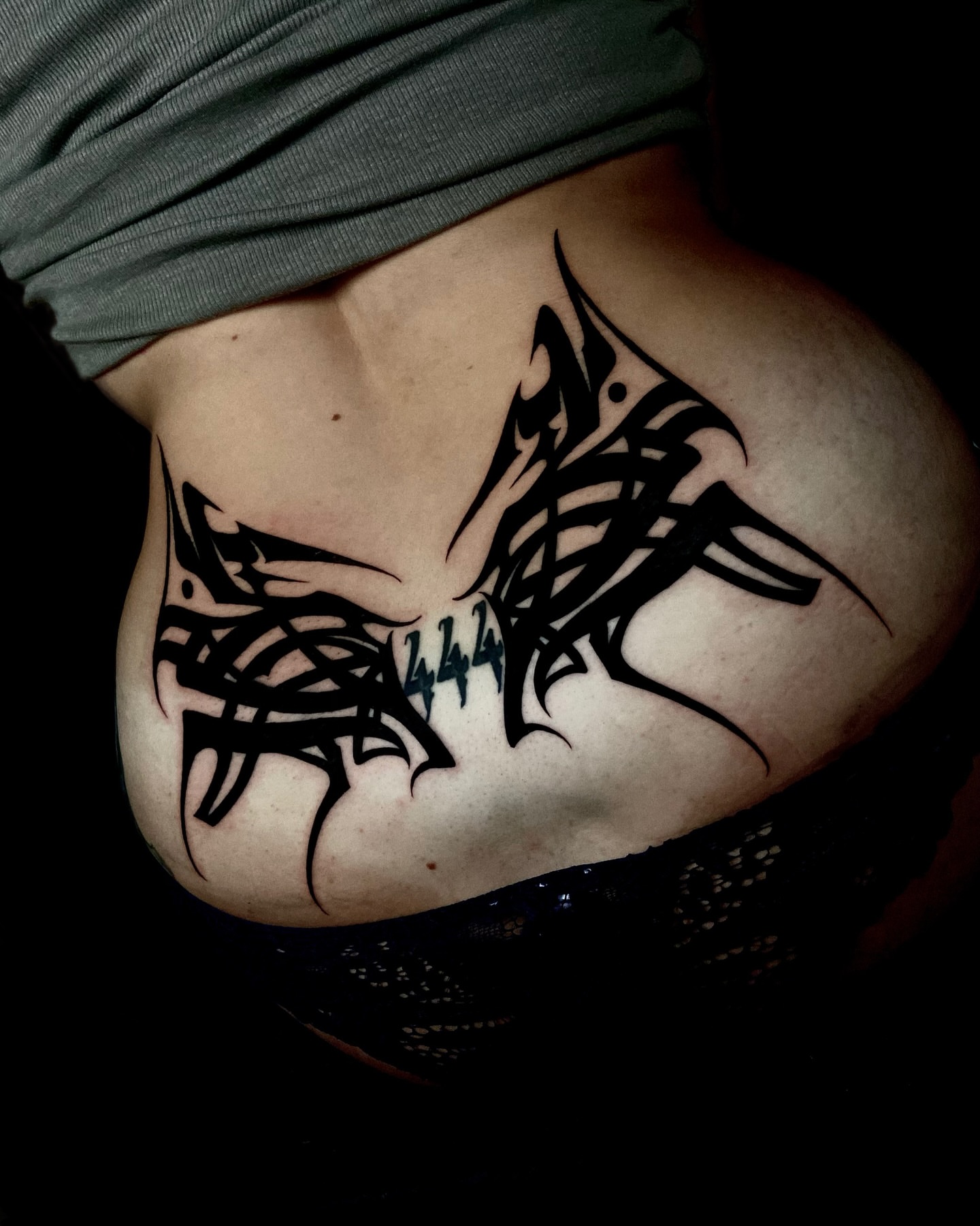 Tribal butterfly tribal tattoo on the ribs by Nathan