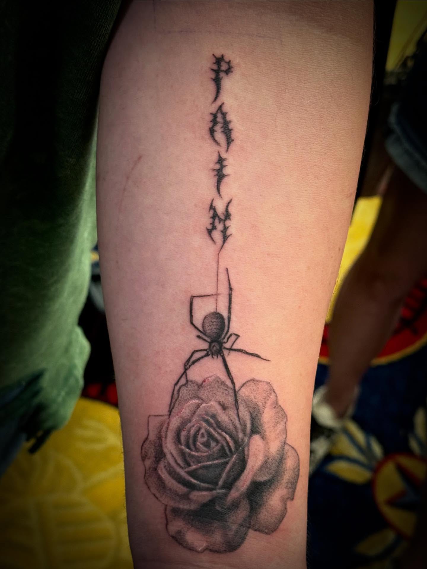 Spider and rose realism tattoo on the forearm by MR
