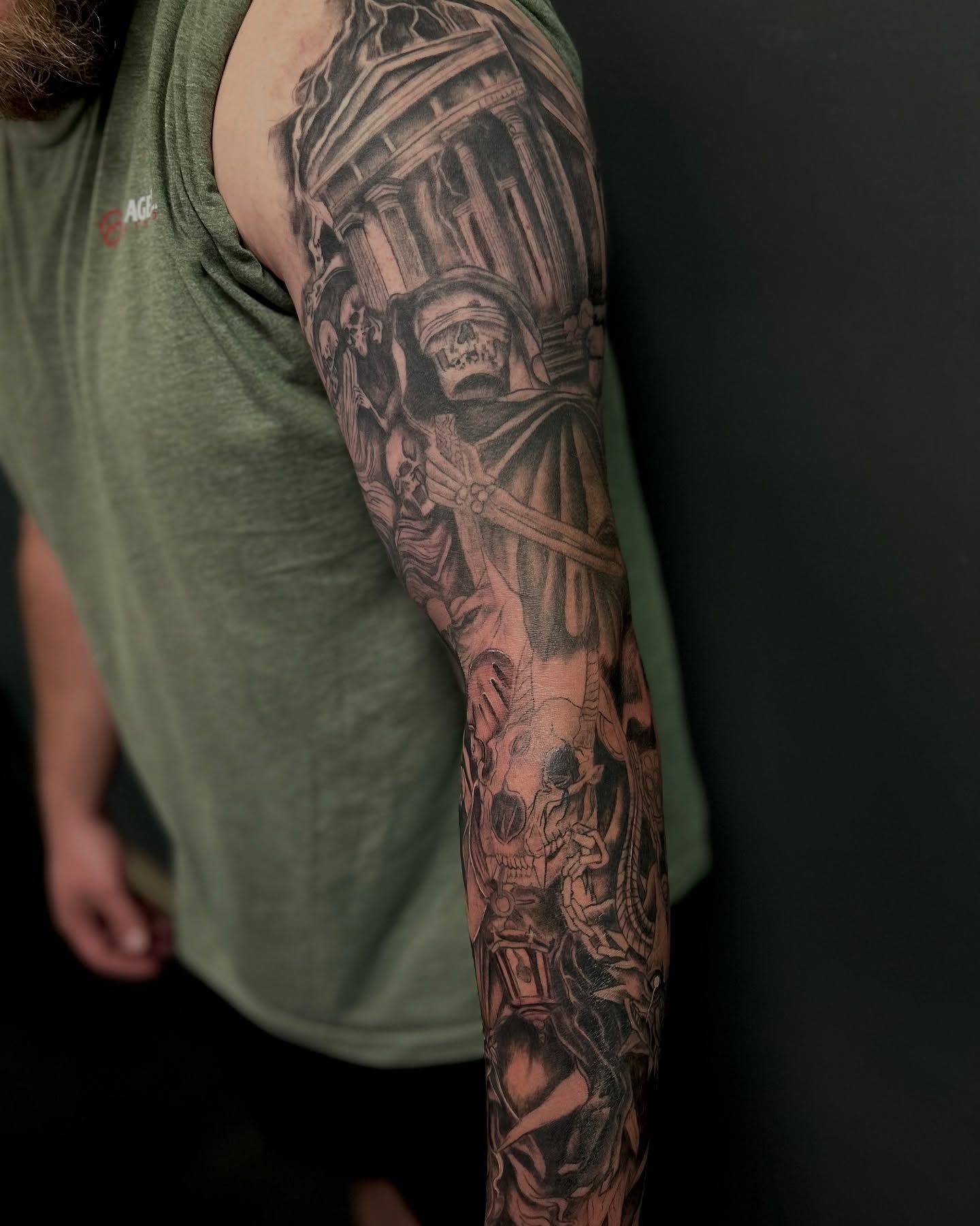 Tattoo by @tat2garrett — black_and_grey, realism