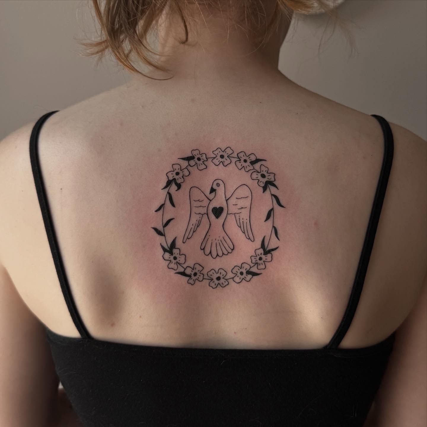 Doves and floral wreath black and grey tattoo on the back by house0fsleep 💤