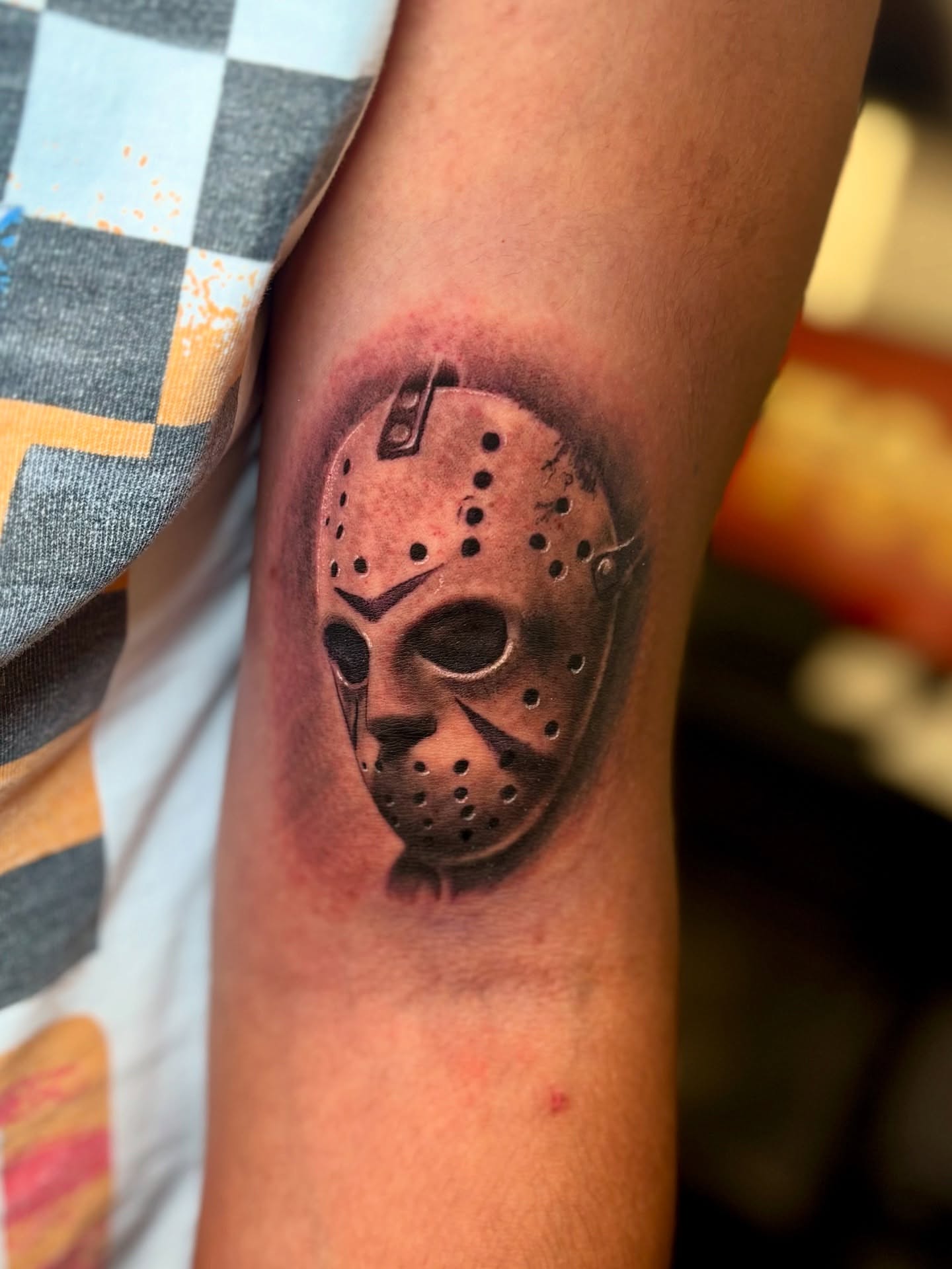 Jason voorhees mask realism tattoo on the forearm by Eric Garcia