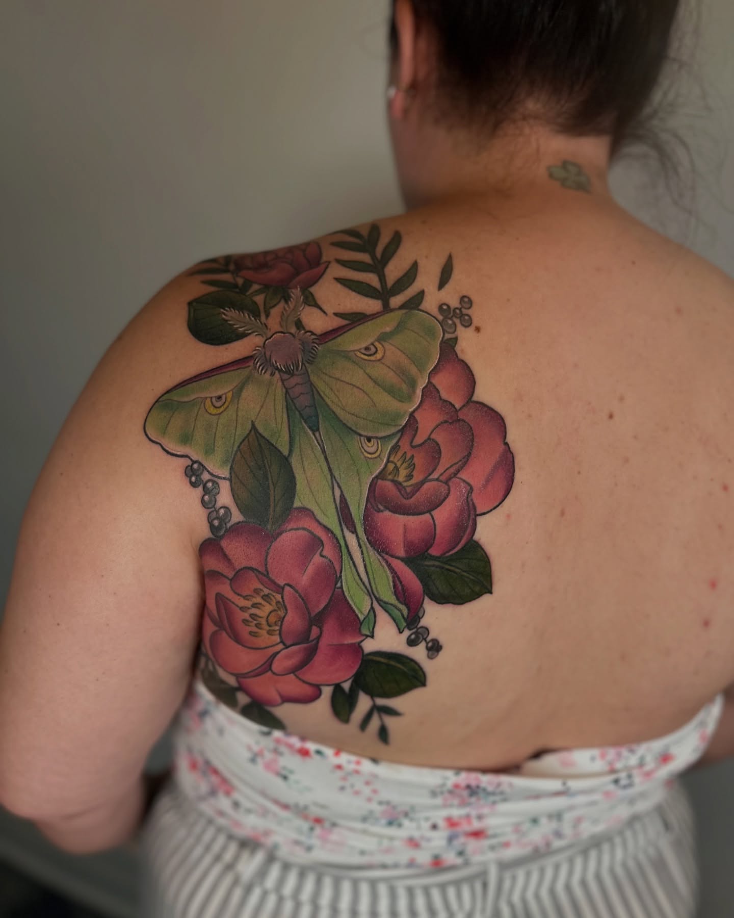Luna moth and flowers American traditional tattoo on the back by ✨Sarah Knapp✨, Eugene, Oregon