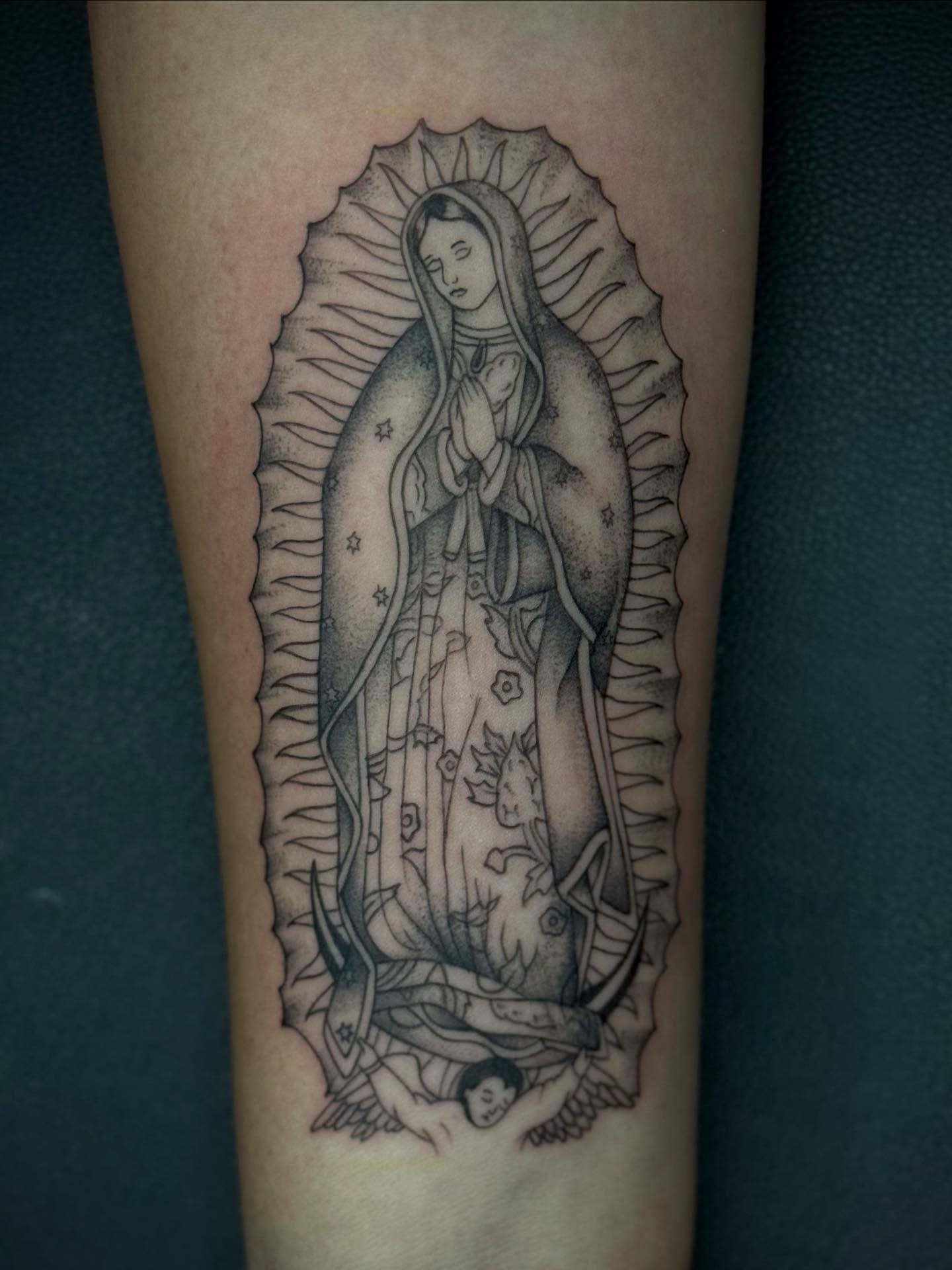 Our Lady of Guadalupe dotwork tattoo on the forearm by Alexa Camacho