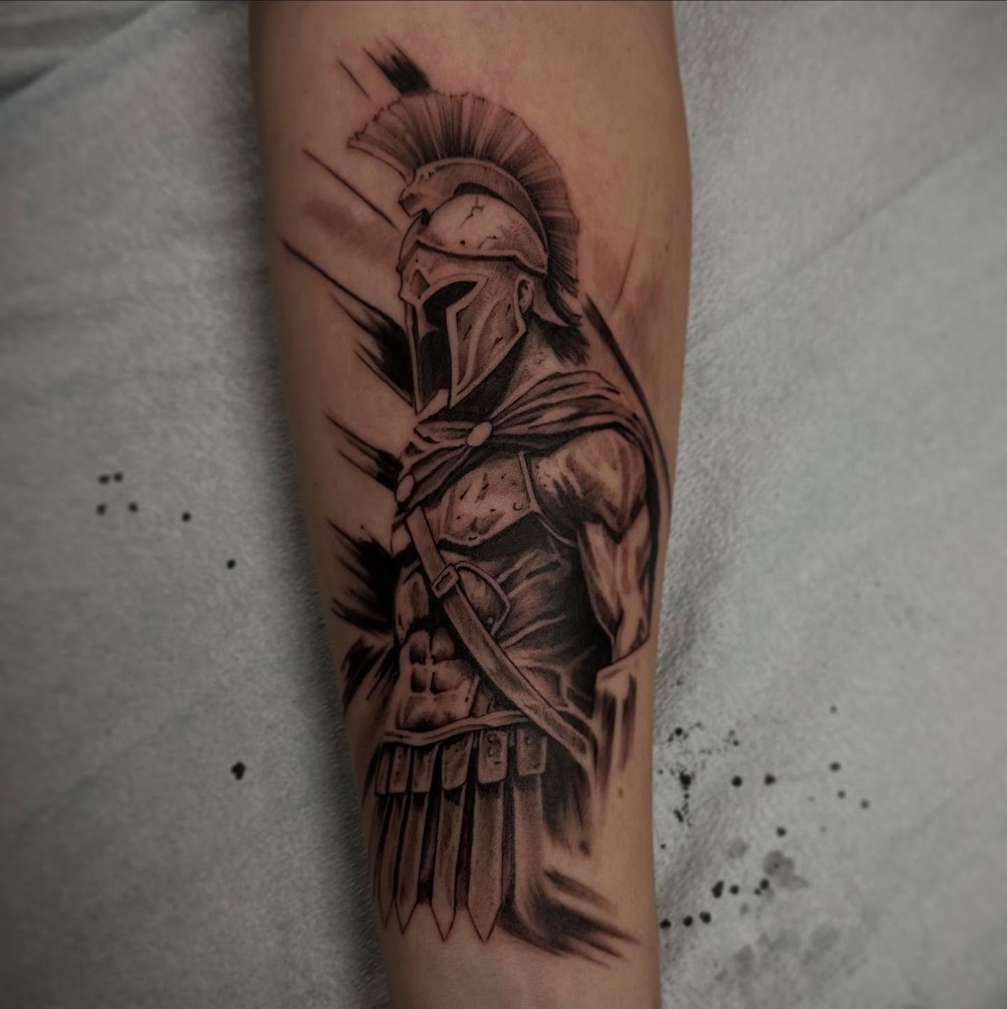 Spartan warrior realism tattoo on the forearm by Sebastian Livingston