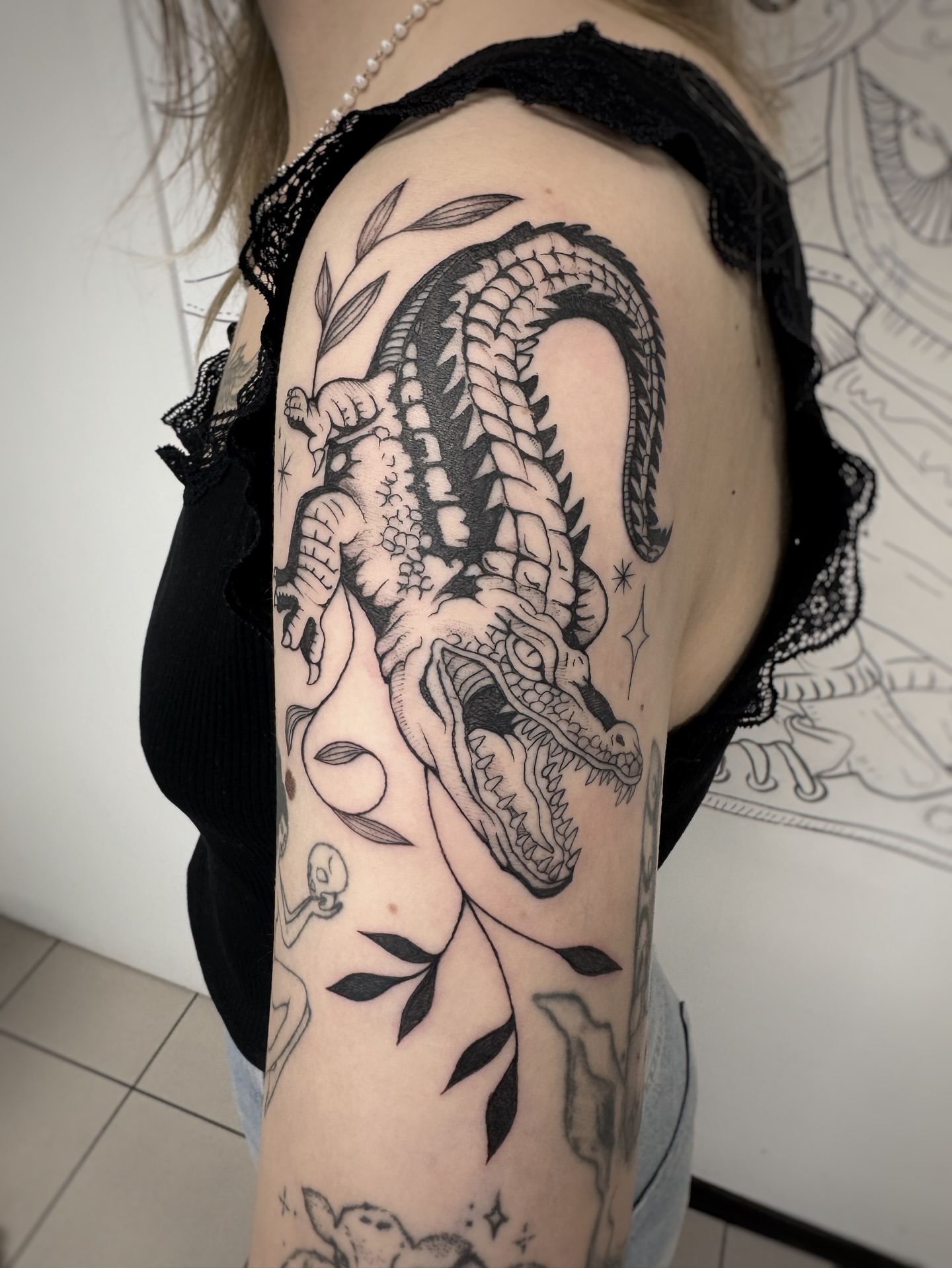 Tattoo by @turned_blue.ink — black_and_grey
