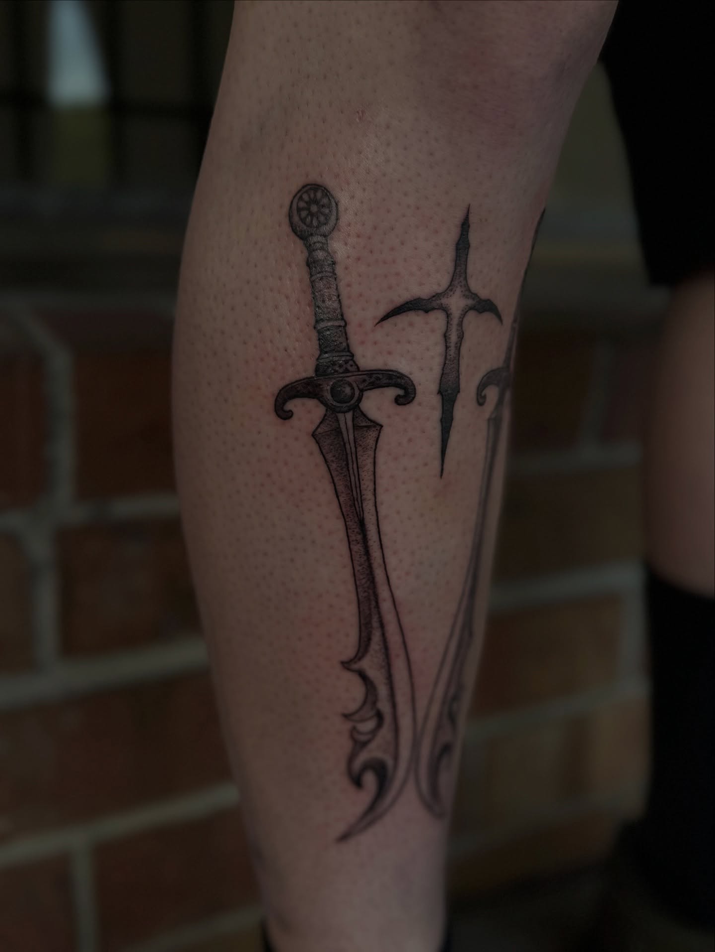 Sword and cross dotwork tattoo on the forearm by 𝔈𝔩𝔦𝔷𝔞𝔟𝔢𝔱𝔥