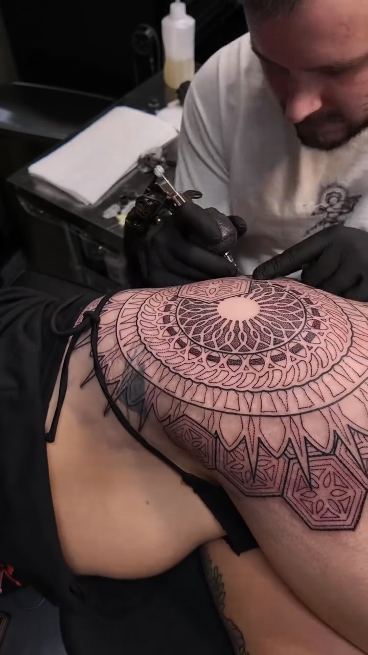 Mandala geometric tattoo by Christofer Irvin