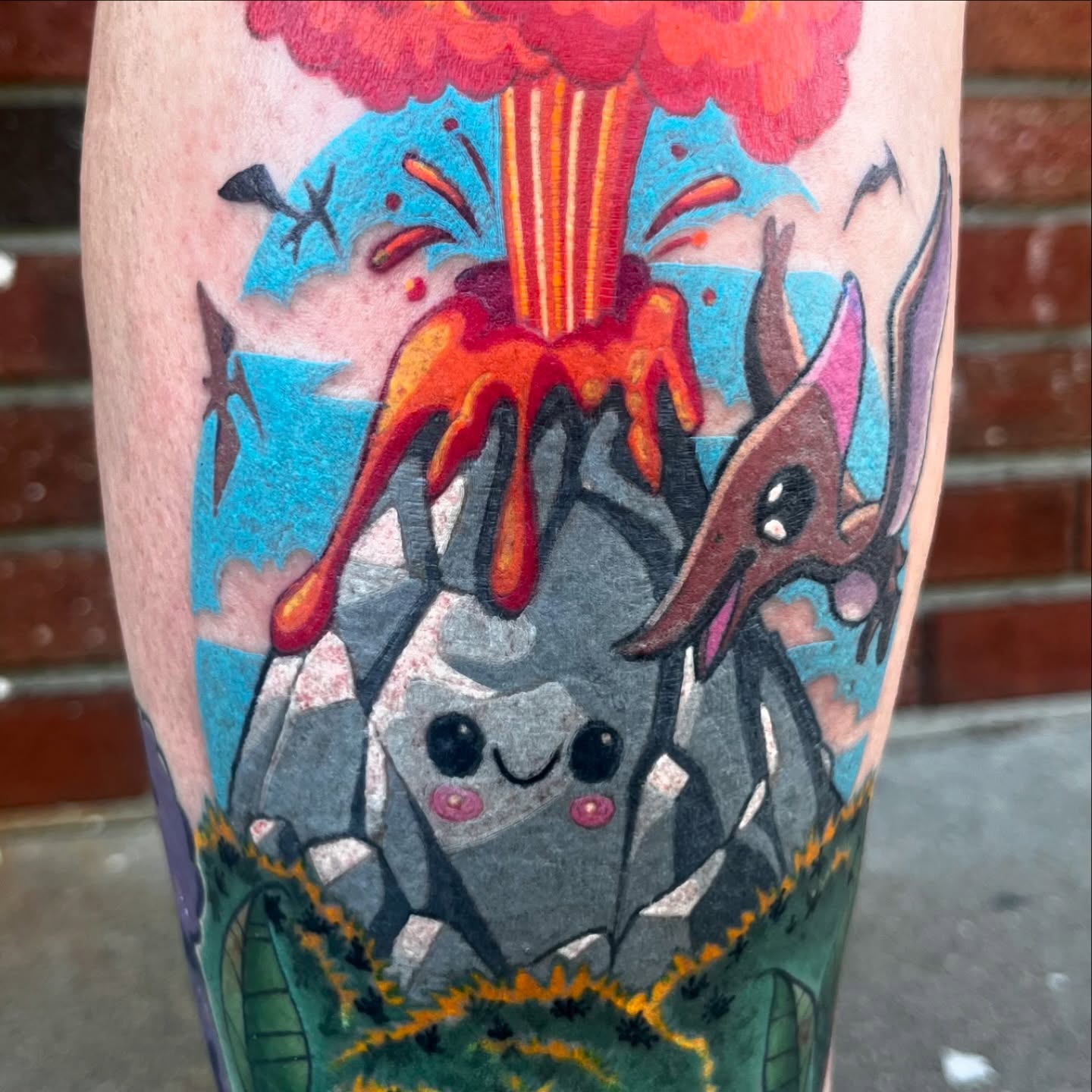 Volcano eruption new school tattoo on the forearm by Brennan Freemantle
