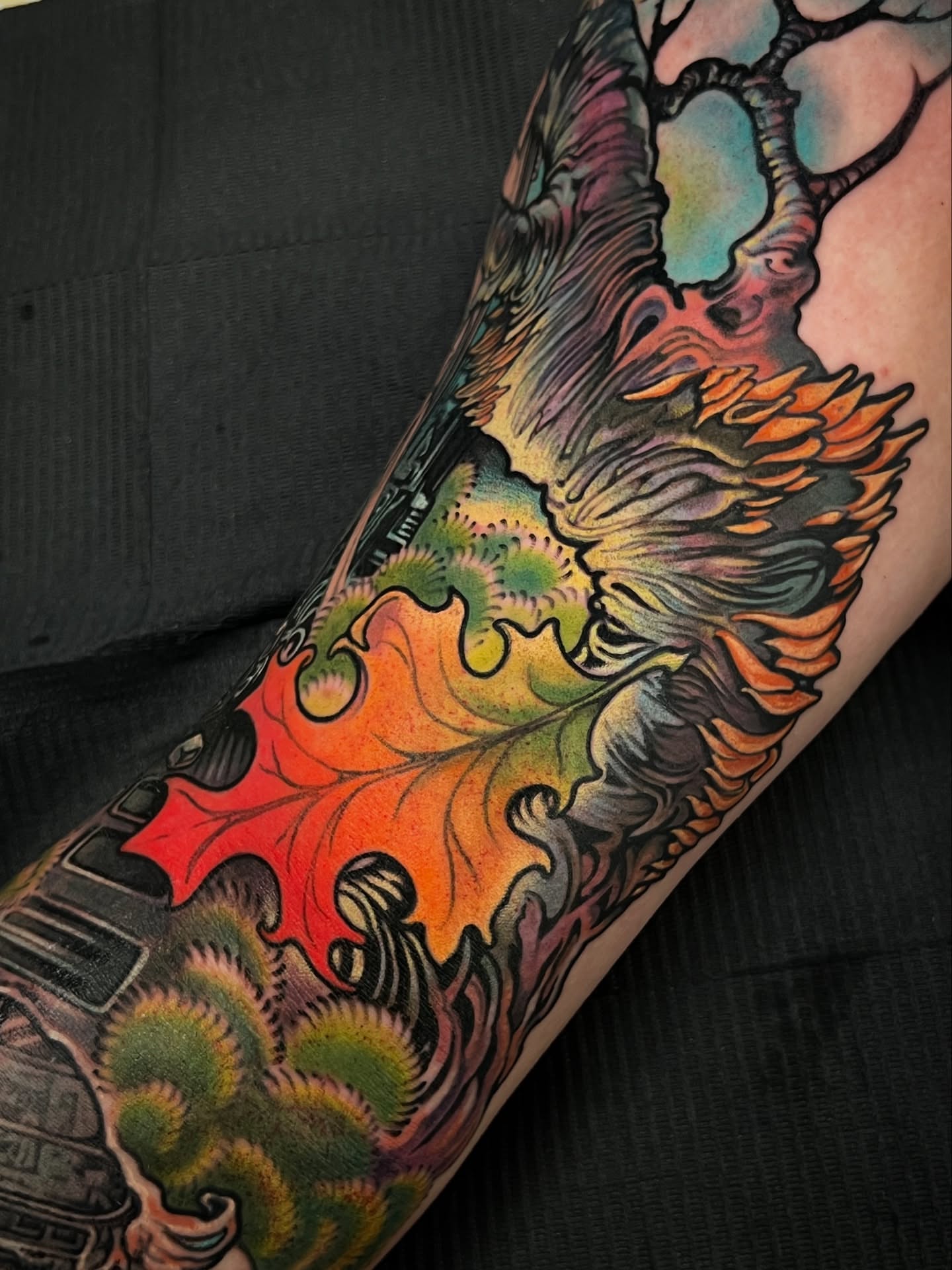 Autumn leaves American traditional tattoo on the forearm by Fredd Chino
