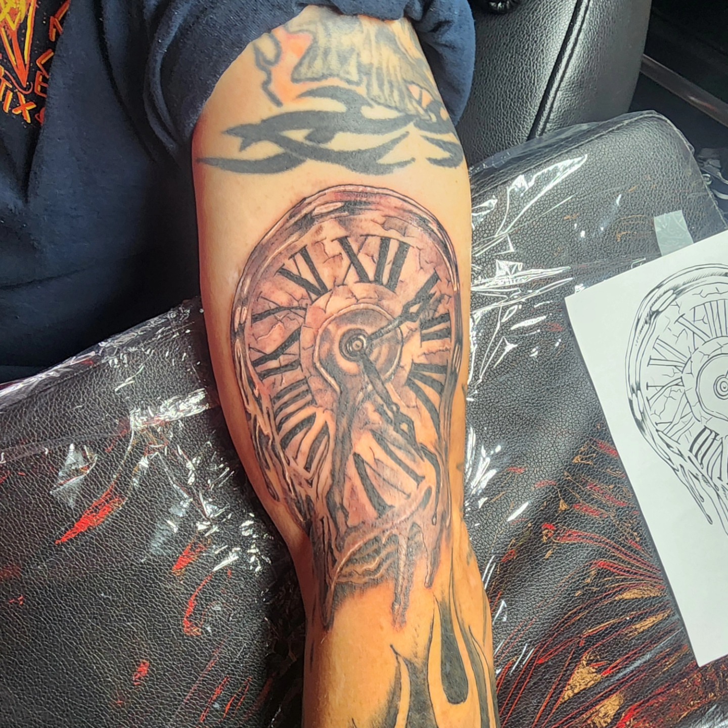 Clock realism tattoo on the forearm by Joe Garcia