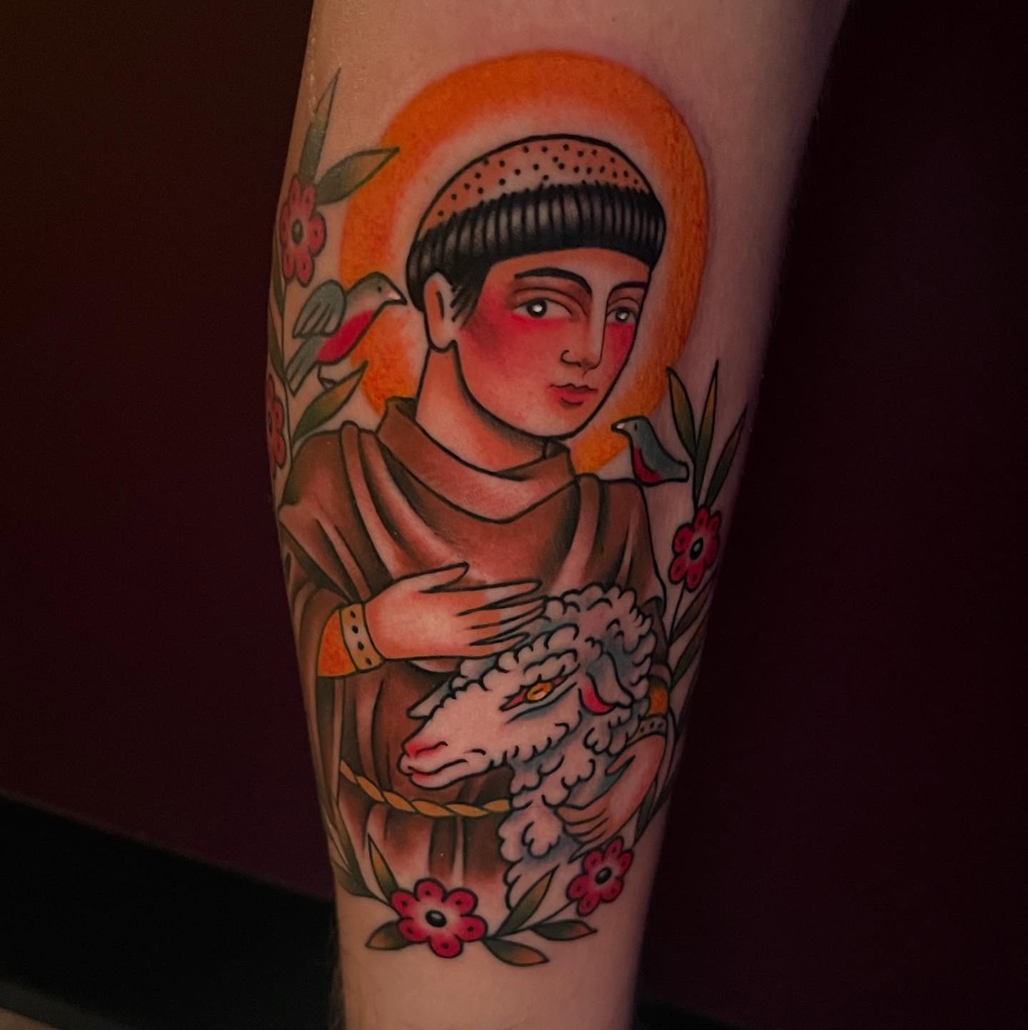 St. francis with lamb American traditional tattoo on the forearm by Holli Marie