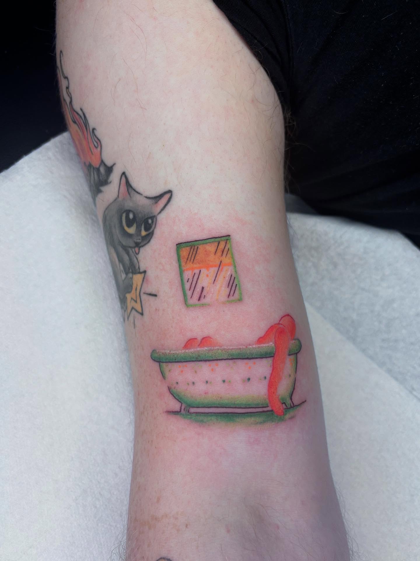 Cat and bathtub new school tattoo on the forearm by π»πΈπ½π½, Ypsilanti, Michigan