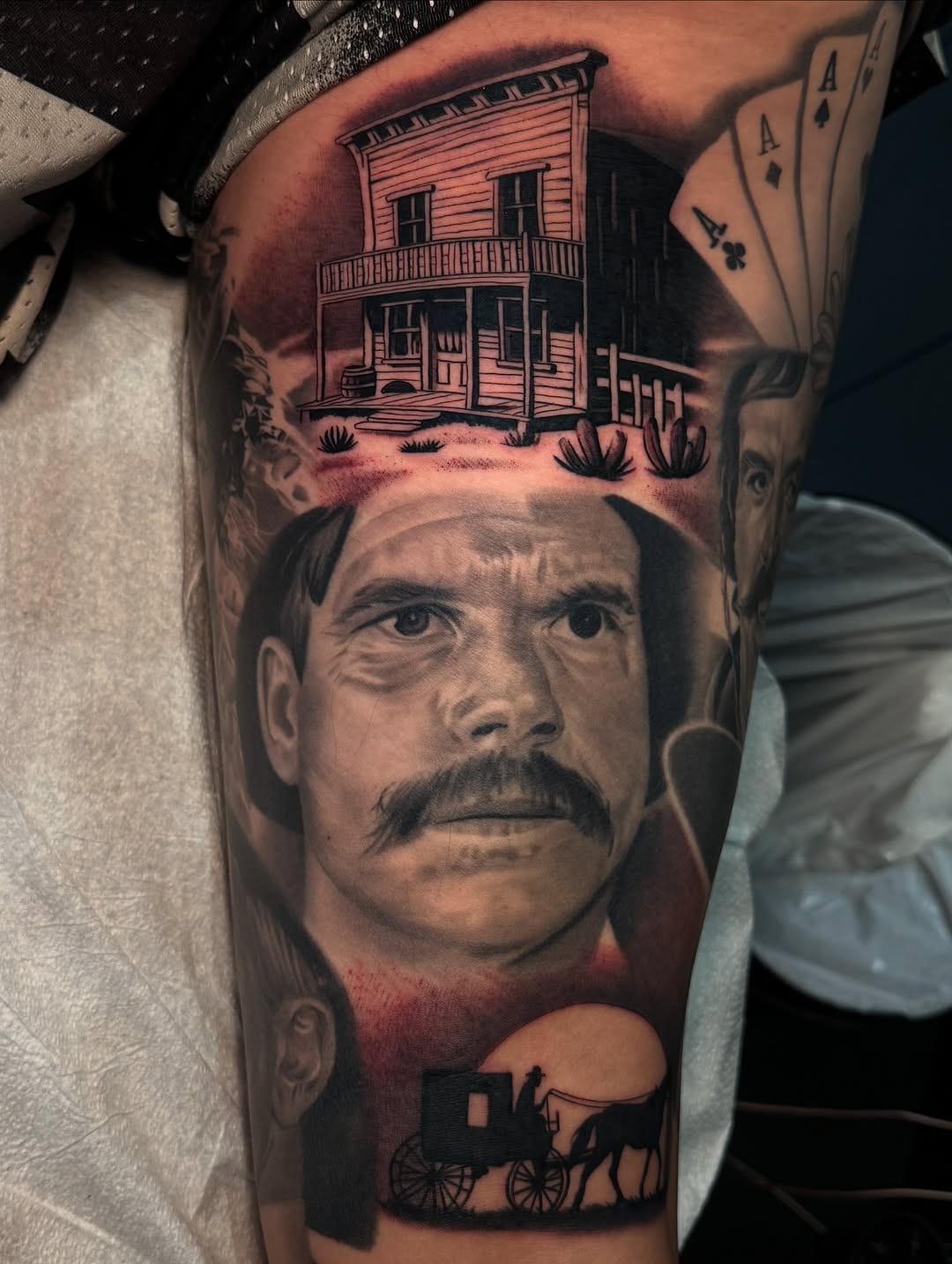 Tattoo by @braddoziertattoos — realism, black_and_grey