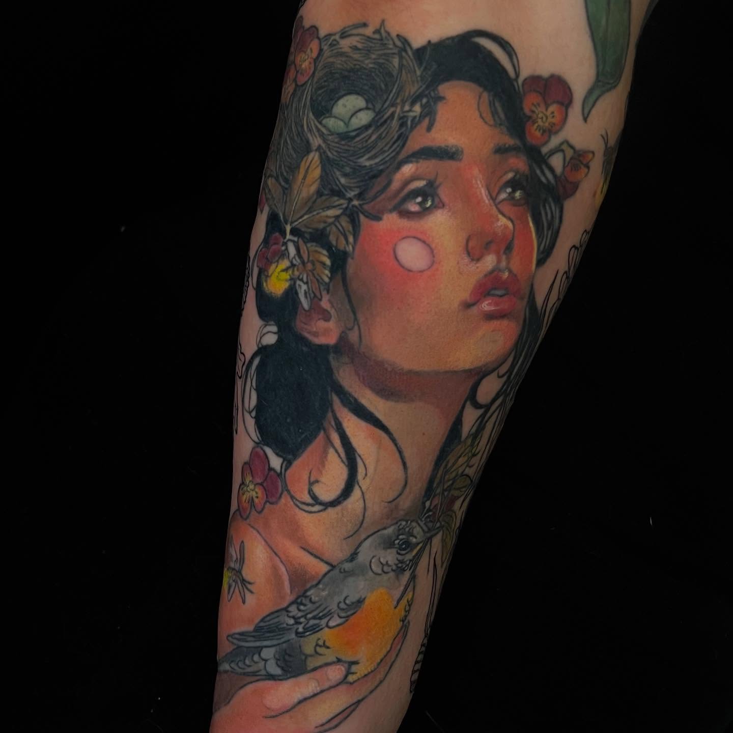 Woman with bird American traditional tattoo on the forearm by Paige Hudon, Chicago, Illinois