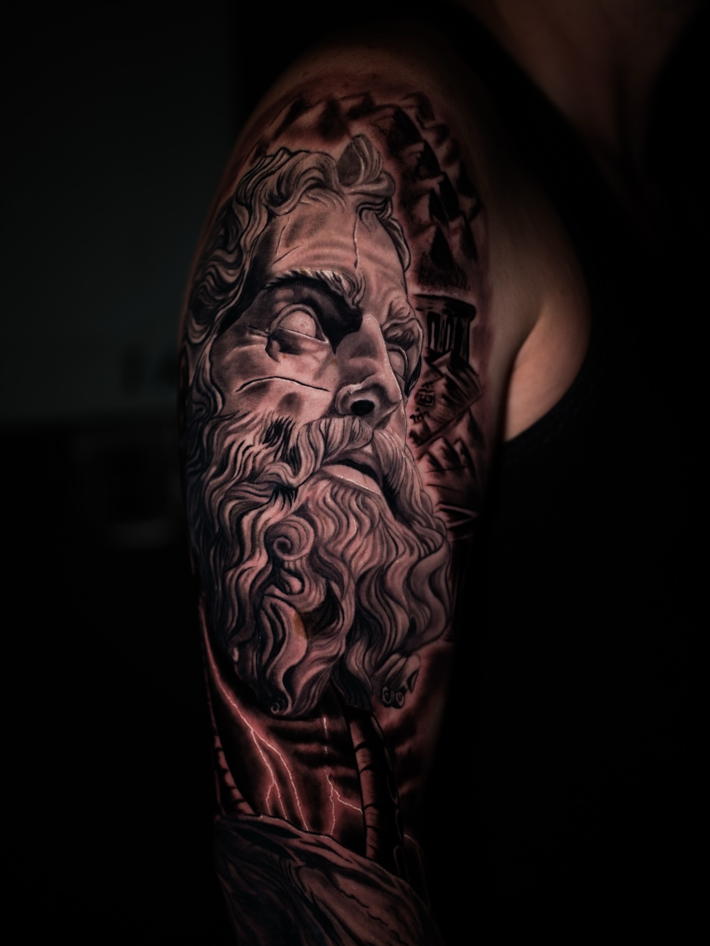 God-like figure realism tattoo on the shoulder by Juan David Arias