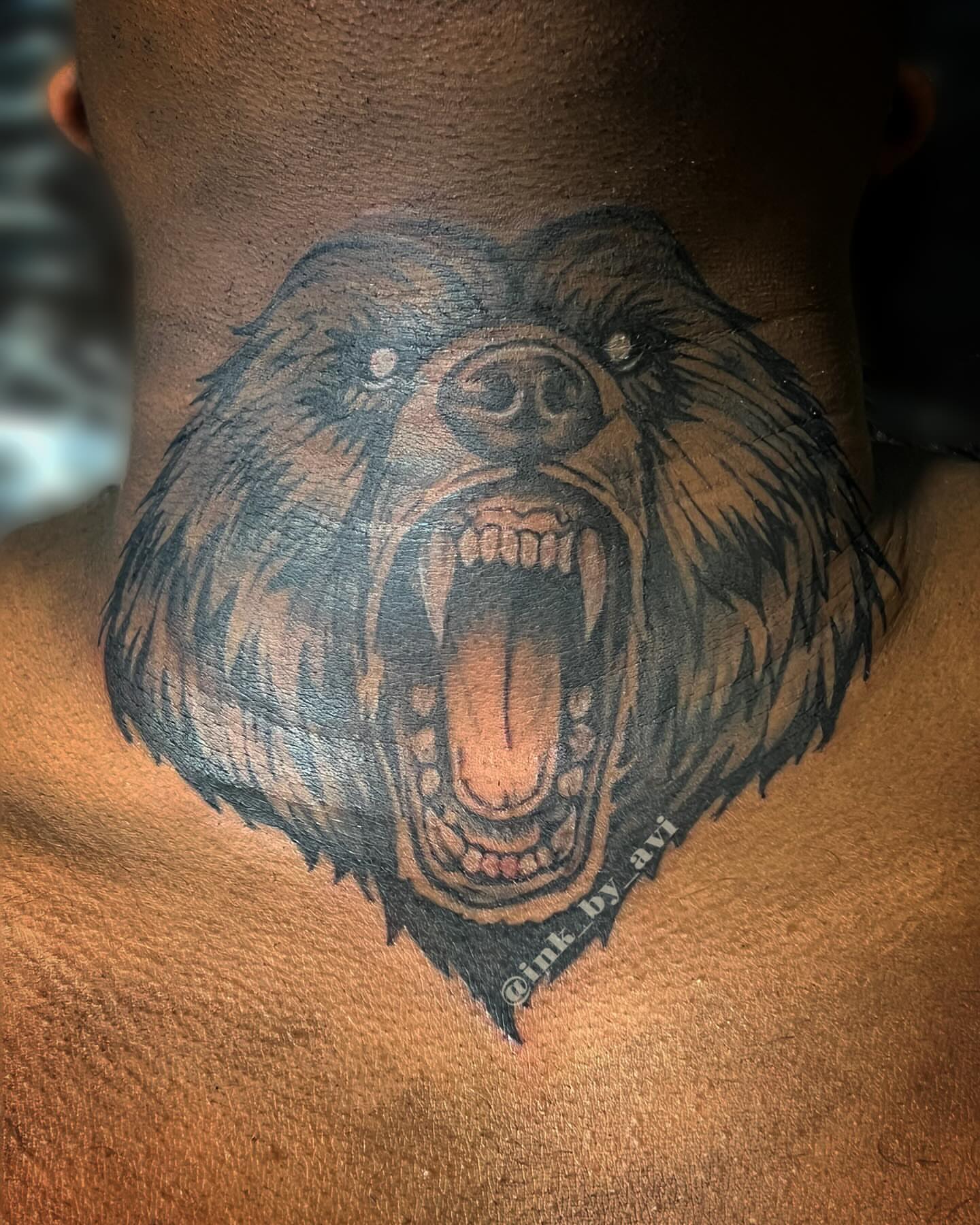 Roaring bear realism tattoo on the back by Avi, Cleveland, Ohio