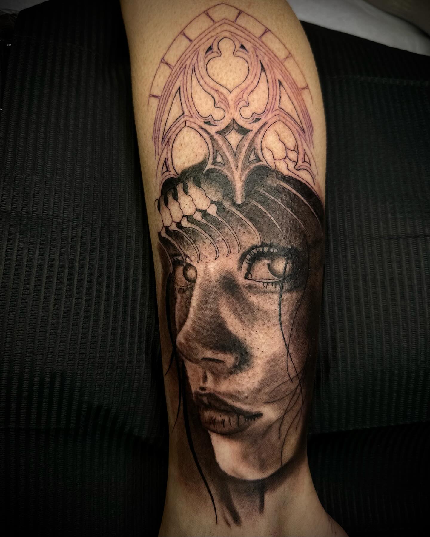 Woman's face realism tattoo on the forearm by Brooks