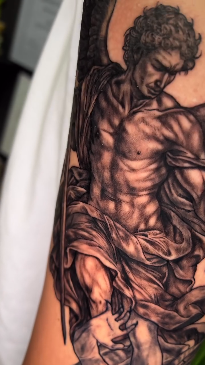 Tattoo by @jaws_the_artist — realism, black_and_grey