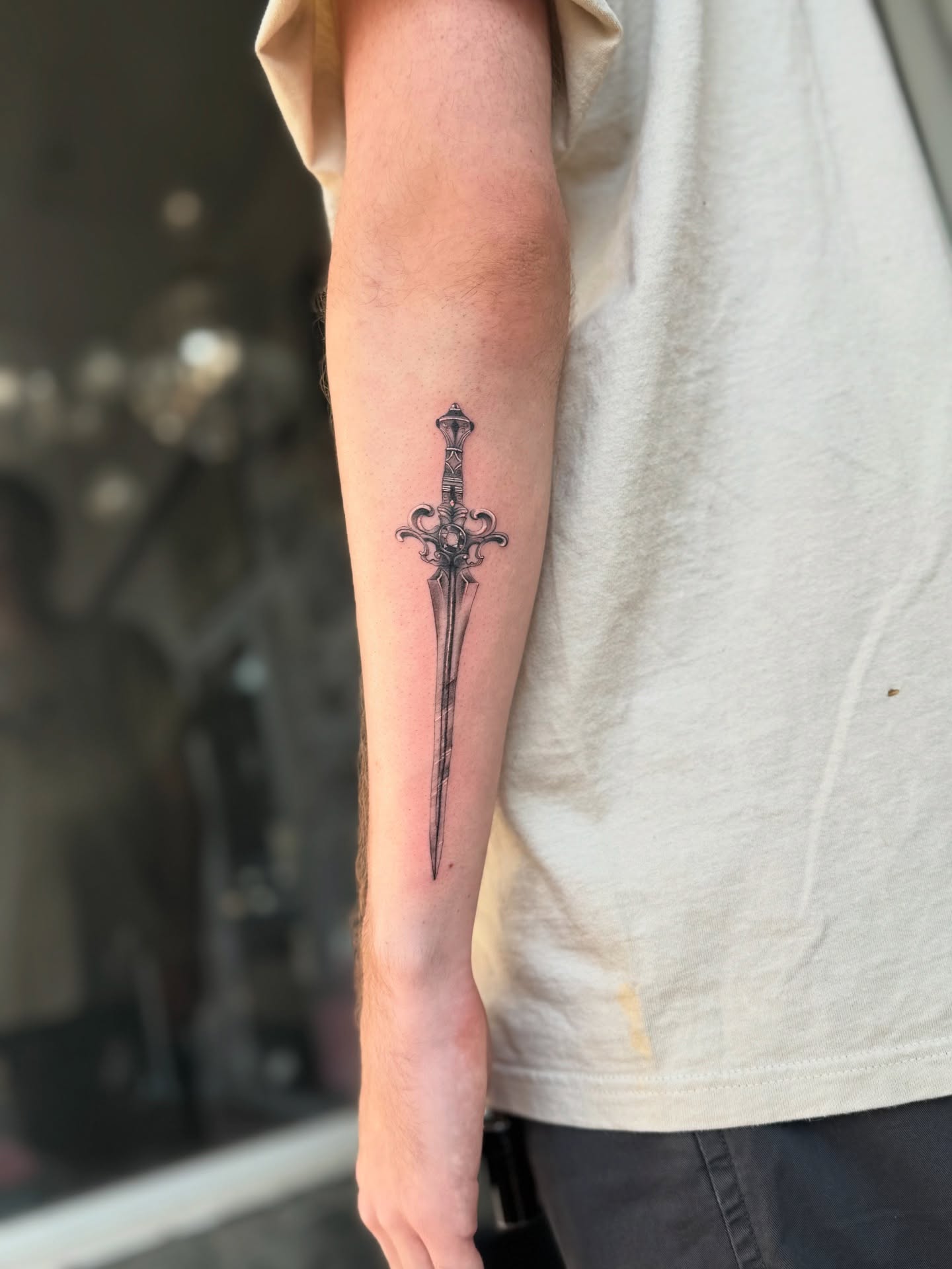 Sword black and grey tattoo on the forearm by Lily Cuoio~ Seattle