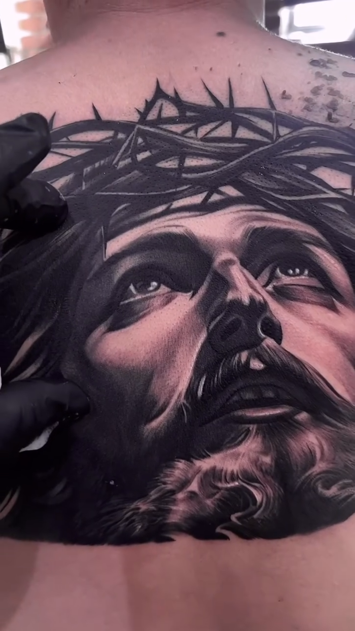 Jesus Christ with crown of thorns realism tattoo by Erick Gutierrez, Las Vegas, Nevada