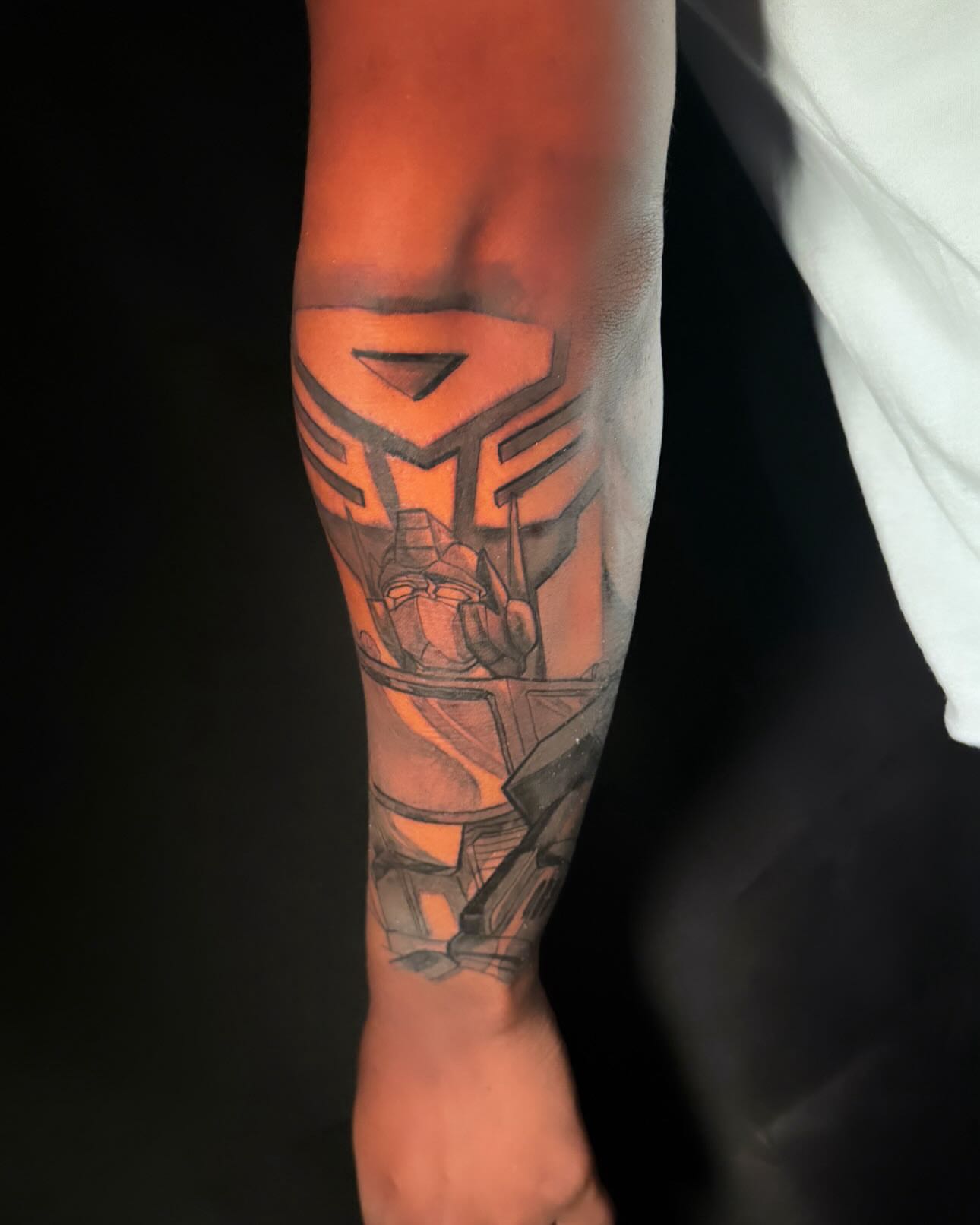 Transformer geometric tattoo on the forearm by Anthony Washington, Atlanta, Georgia