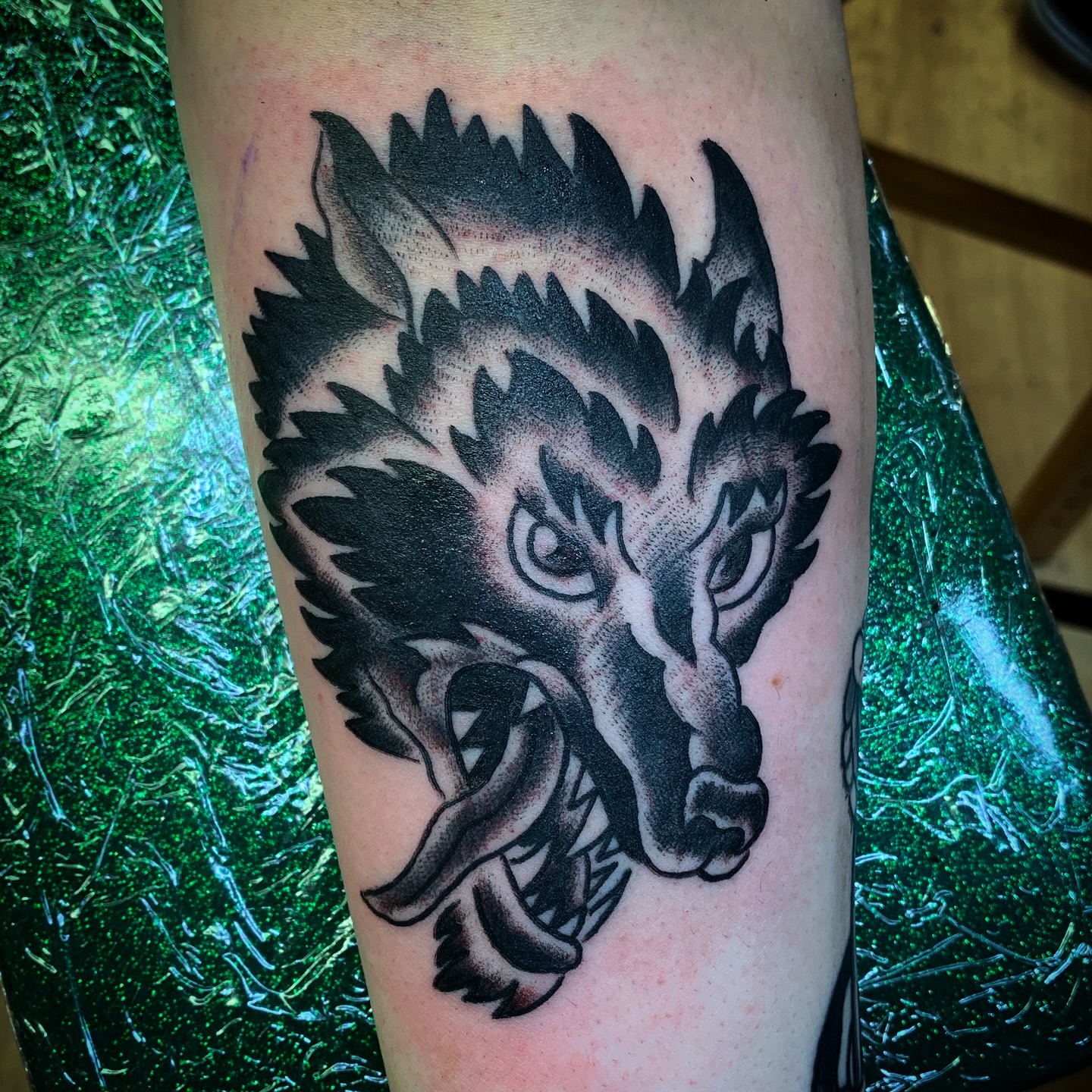 Wolf head black and grey tattoo on the forearm by Tattoos Las Vegas,NV