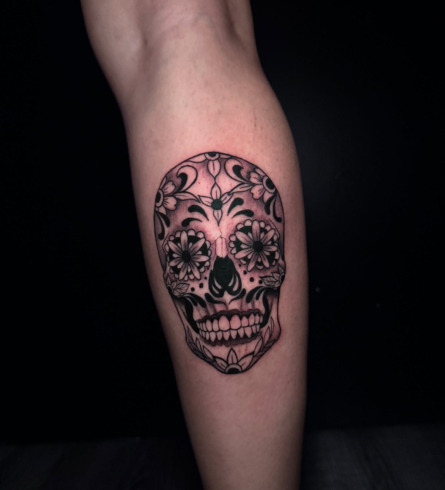 Sugar skull Chicano tattoo on the forearm by Ryland - Tattoo Artist