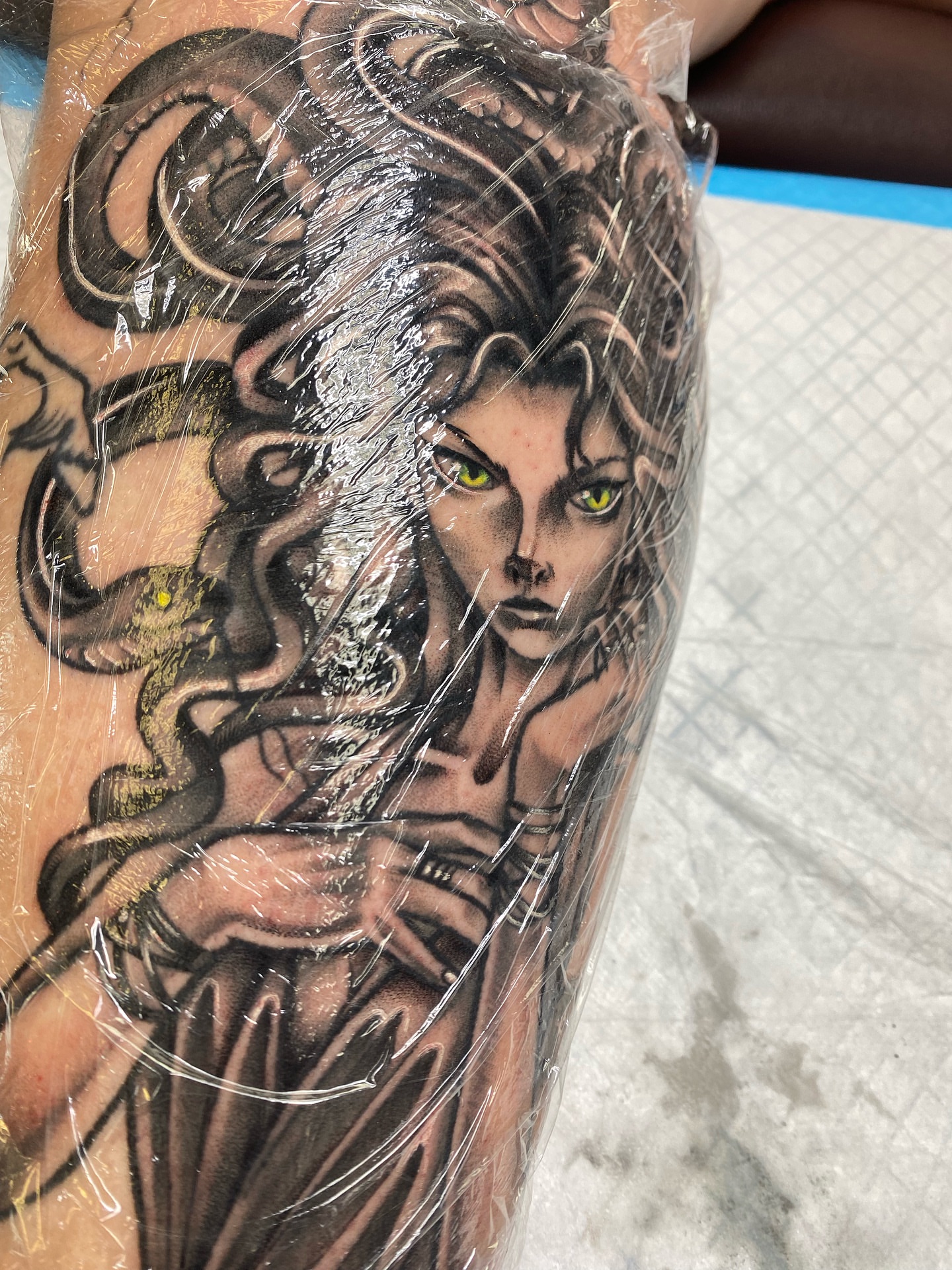 Woman with snakes realism tattoo on the forearm by Tattertot