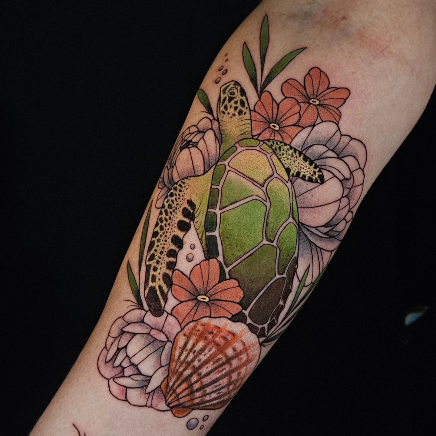 Turtle and flowers watercolor tattoo on the forearm by Chloe🌿Tattoos