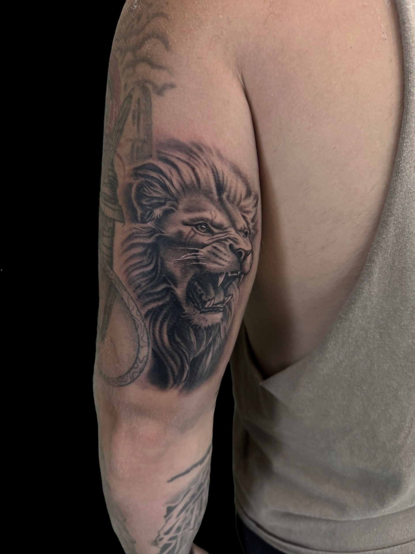 Lion realism tattoo on the forearm by Blake Owens, Nashville, Tennessee