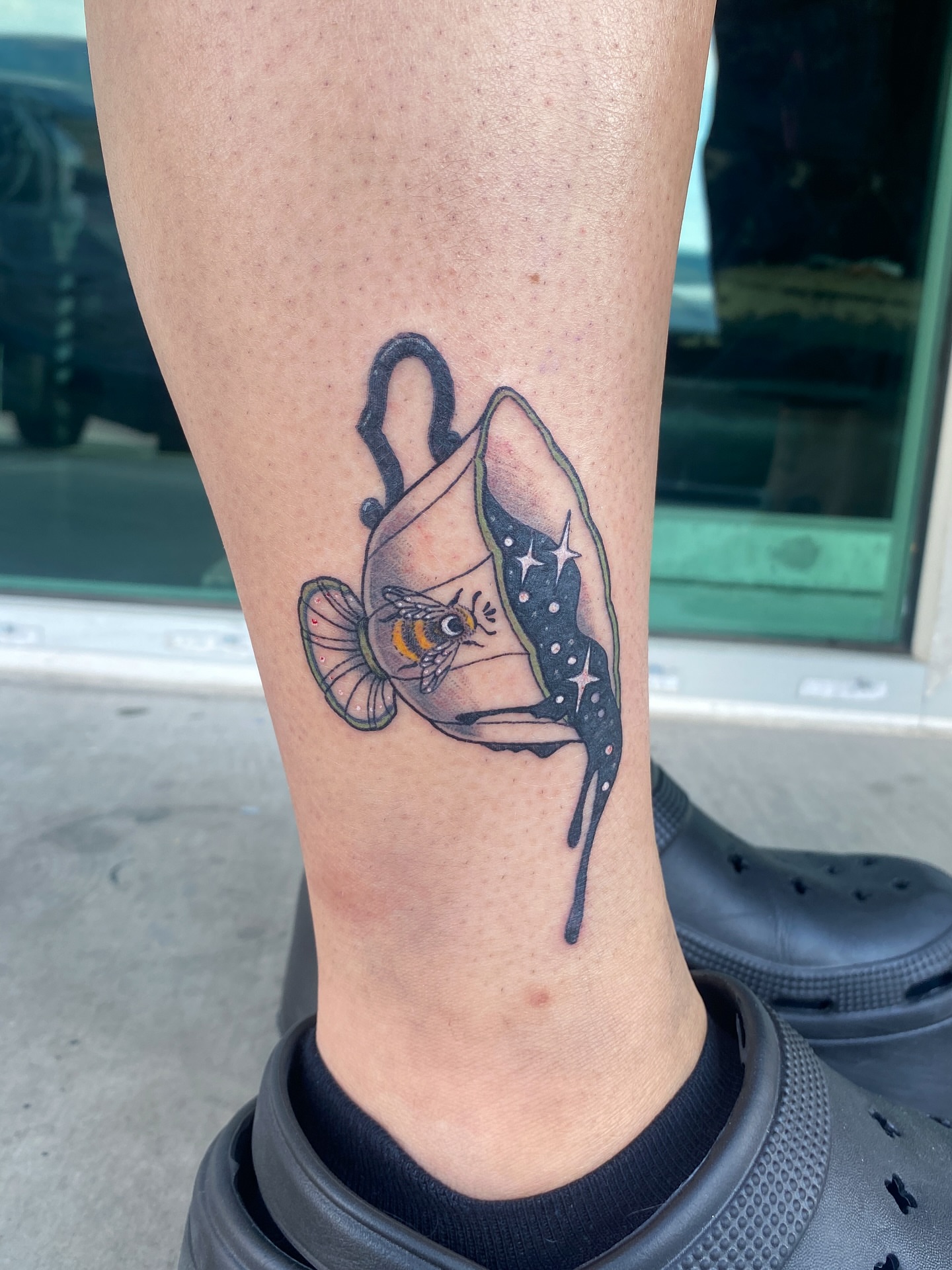 Coffee cup and bee dotwork tattoo on the forearm by Elliot Jaye Valentine