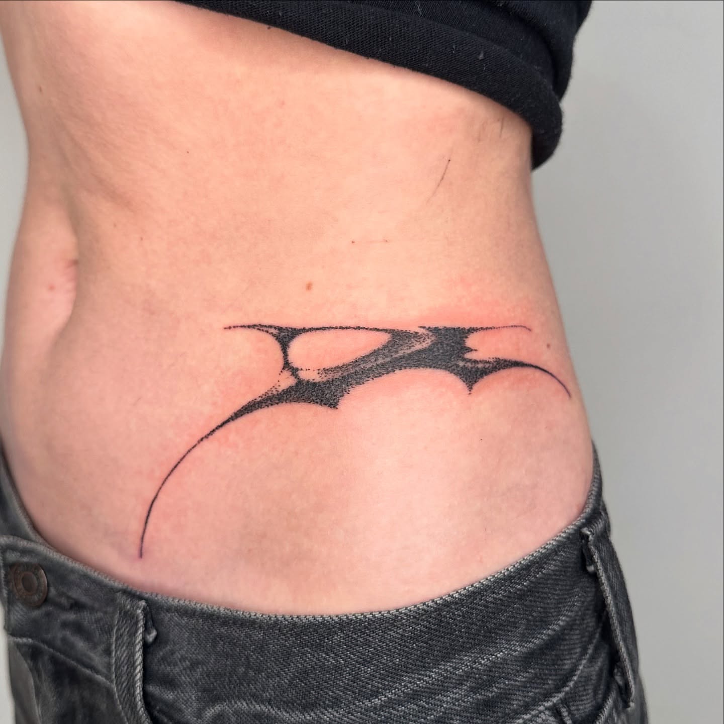Bat silhouette black and grey tattoo on the ribs by πΈππππππ