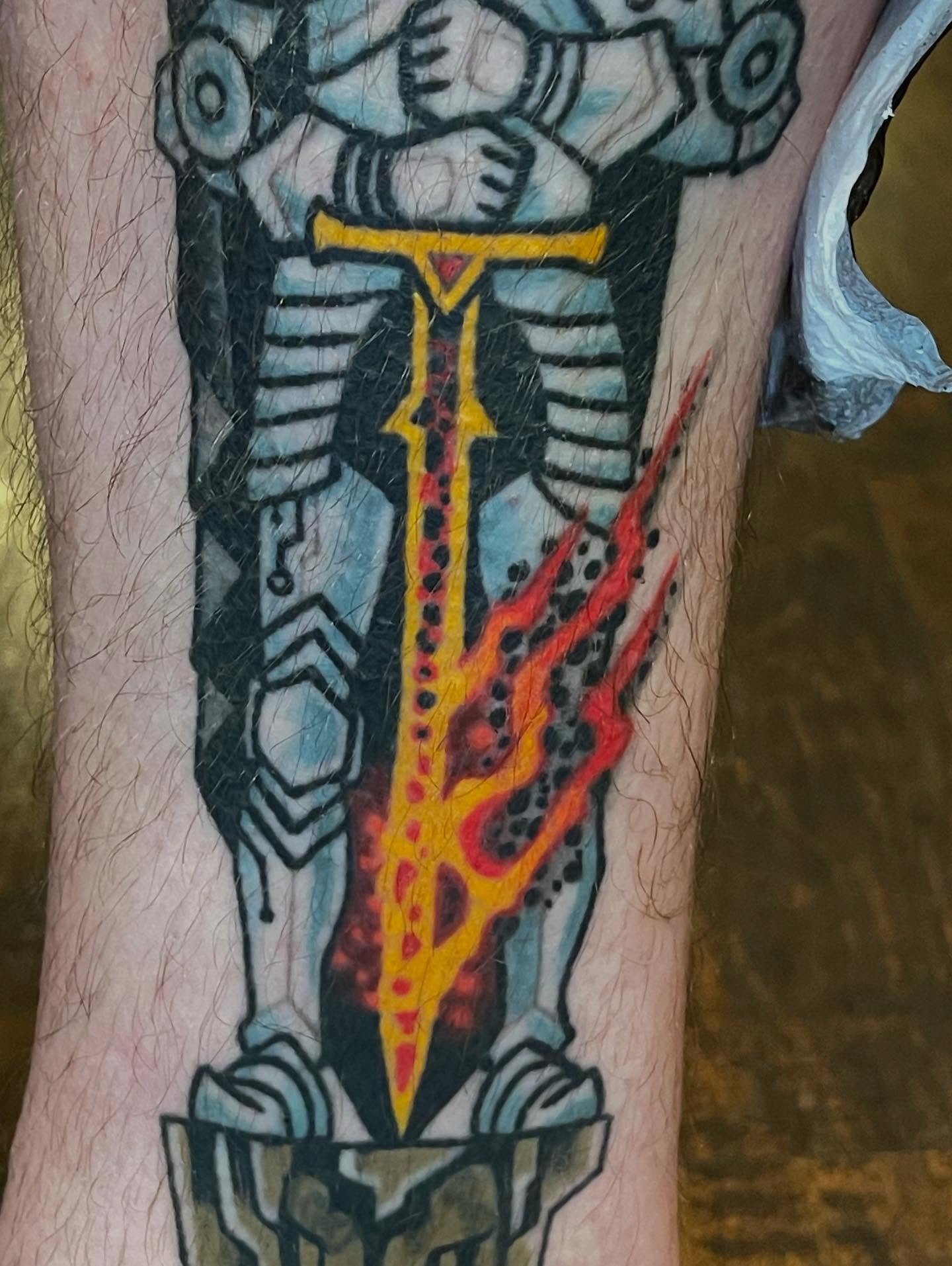 Flame and sword dotwork tattoo on the forearm by Ian Bederman, Austin, Texas