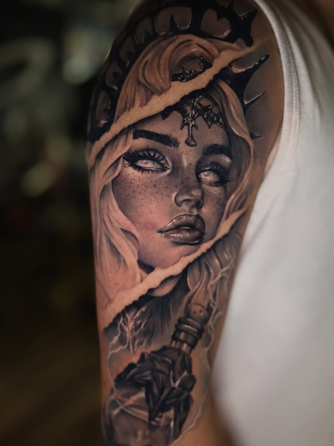 Sorceress with potion bottle realism tattoo on the forearm by Bailey Hancock