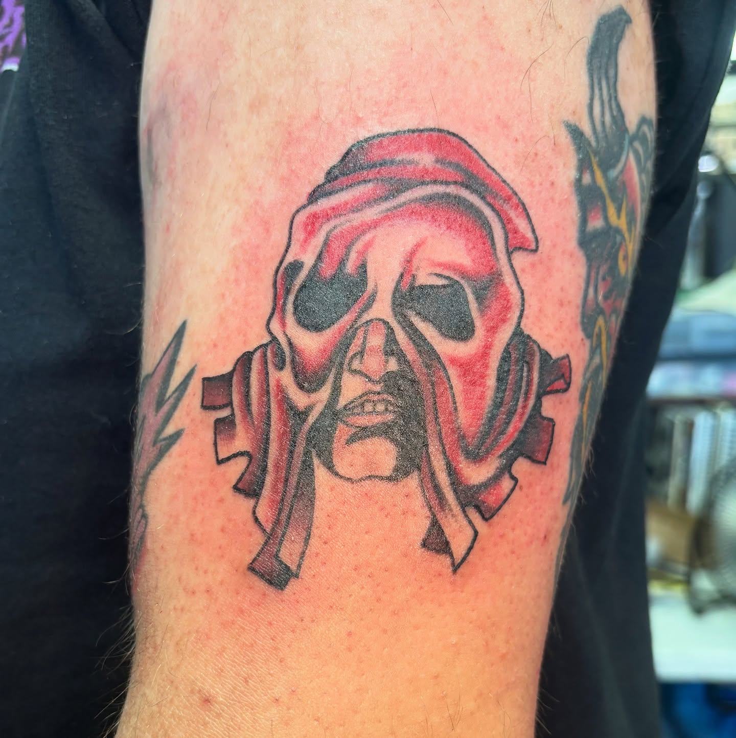 Gas mask realism tattoo on the forearm by Jordan Wray