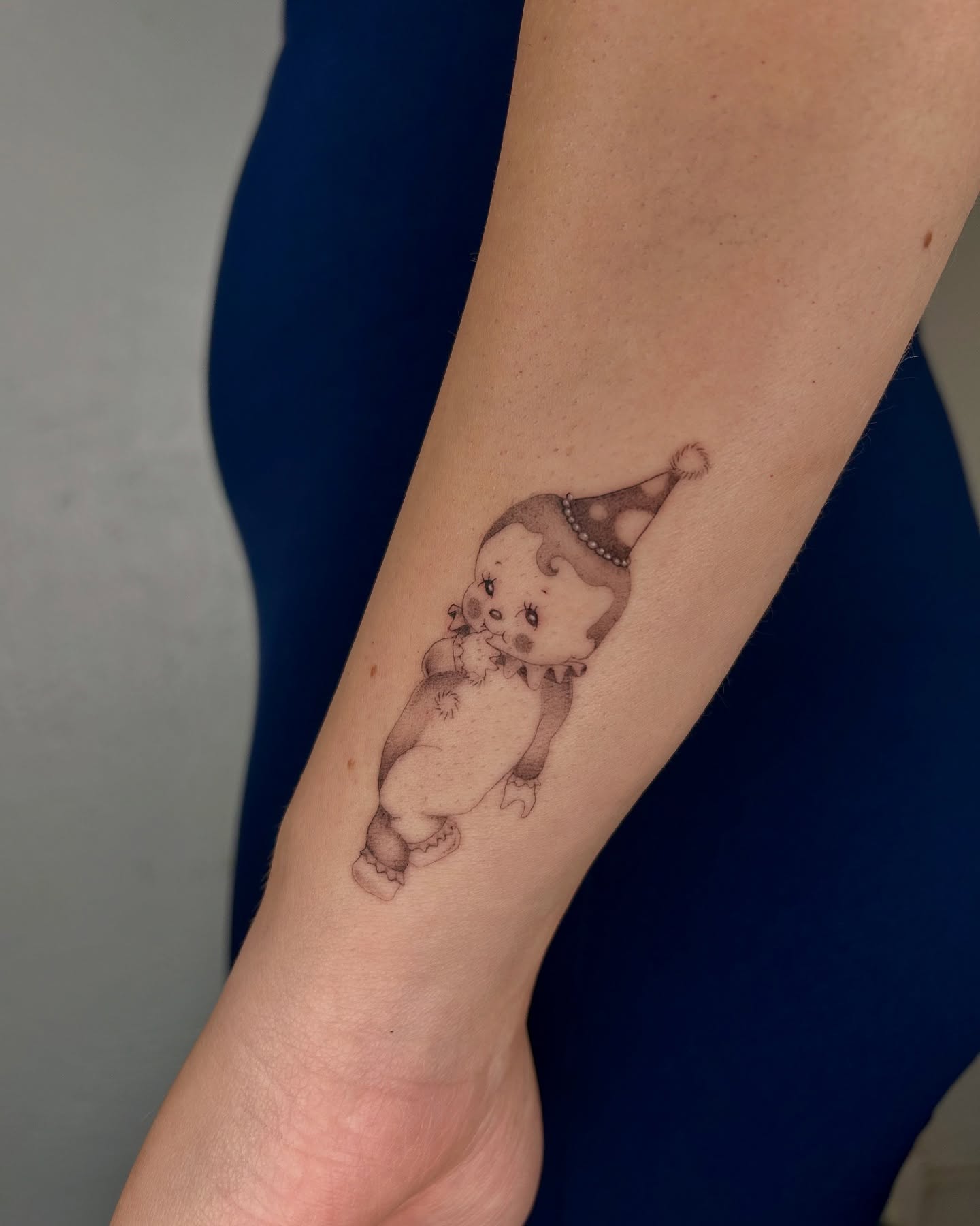 Baby clown black and grey tattoo on the forearm by ✭ Elisa ✭