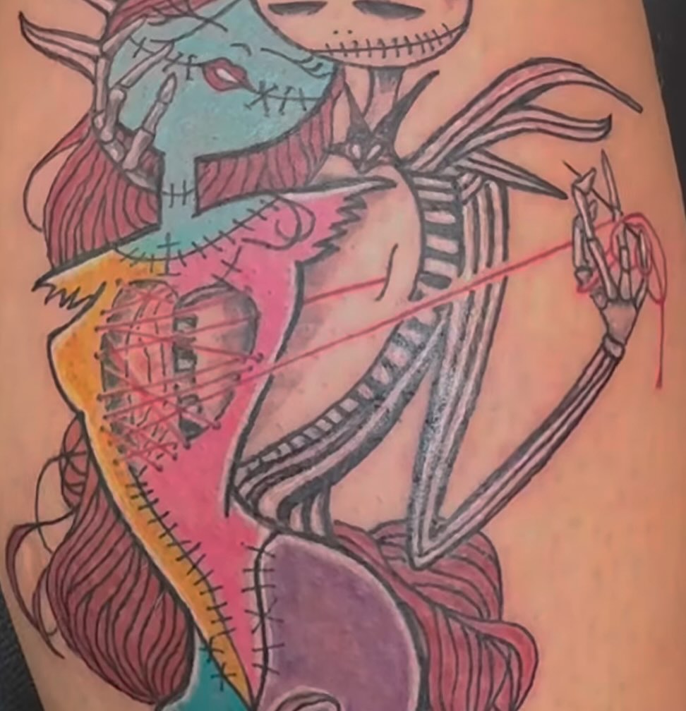 Skeleton couple American traditional tattoo on the thigh by Zen Forbes