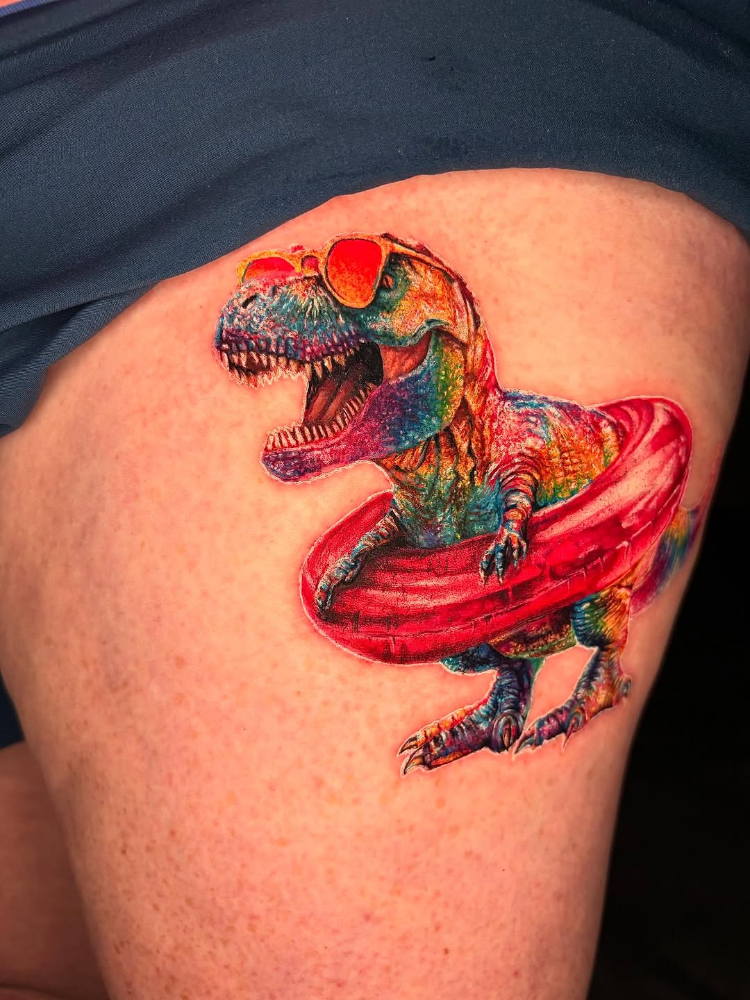 Watercolor tattoo on the thigh by Jacee Hamilton