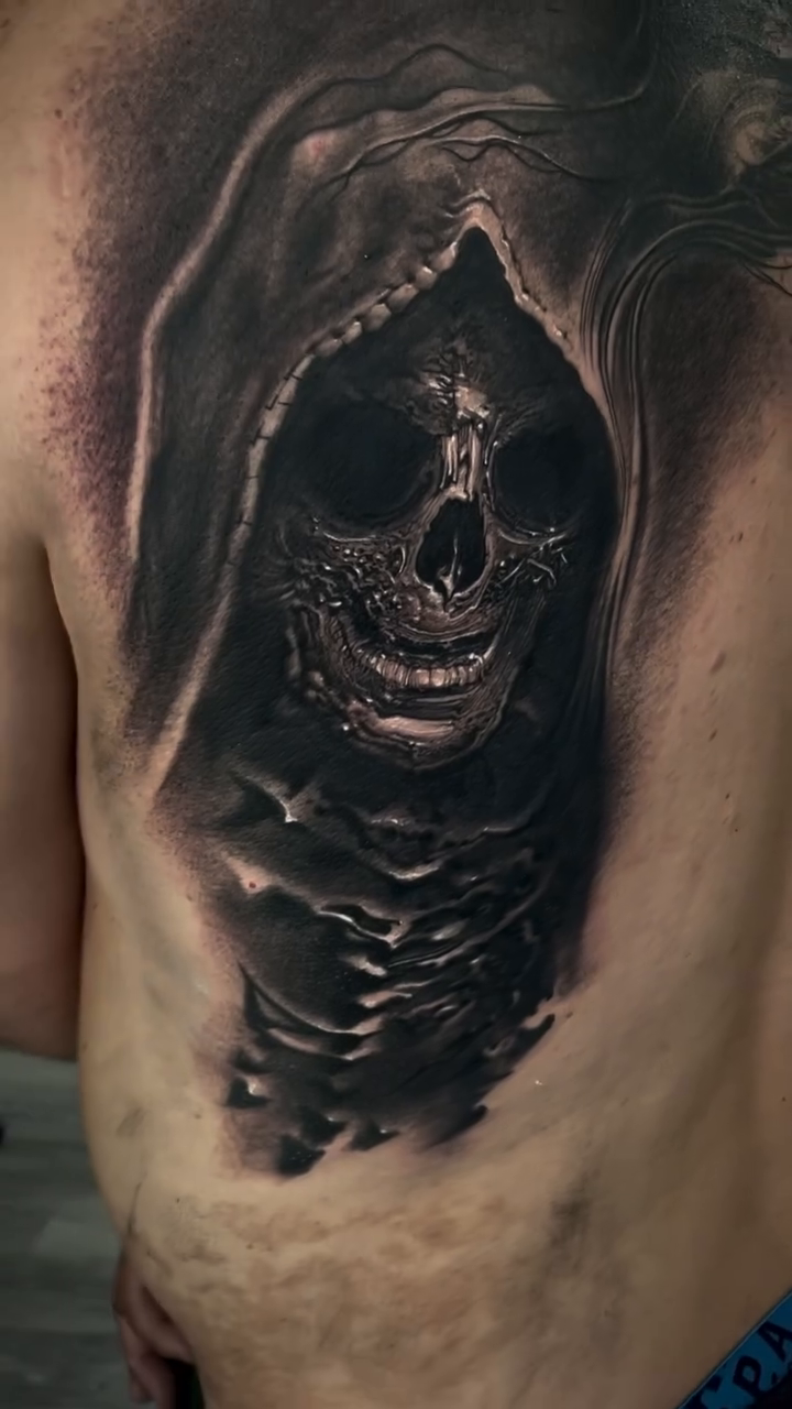 Grim reaper skull dark realism tattoo by Robert Hernandez