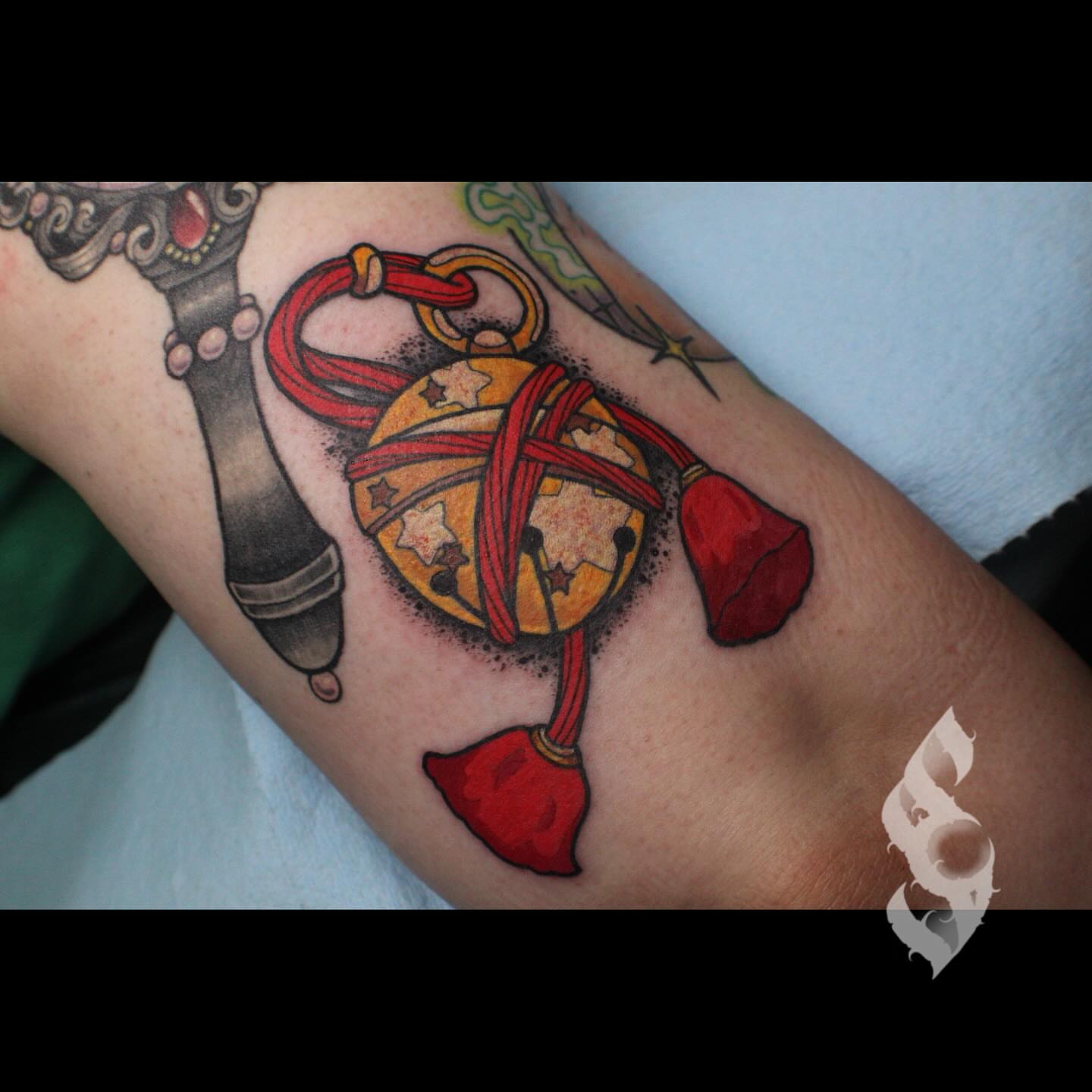 Christmas ornament dotwork tattoo on the forearm by Amanda Stampfly