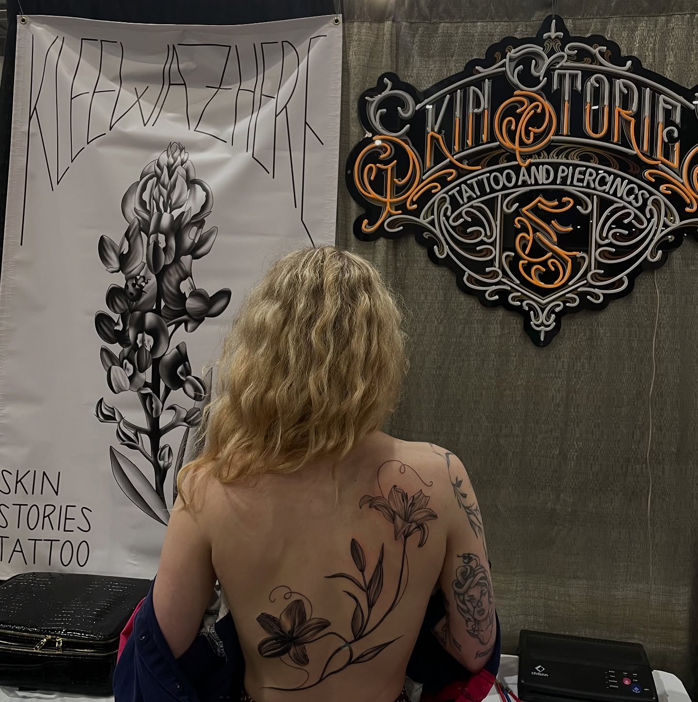 Floral design black and grey tattoo on the back by kaylee