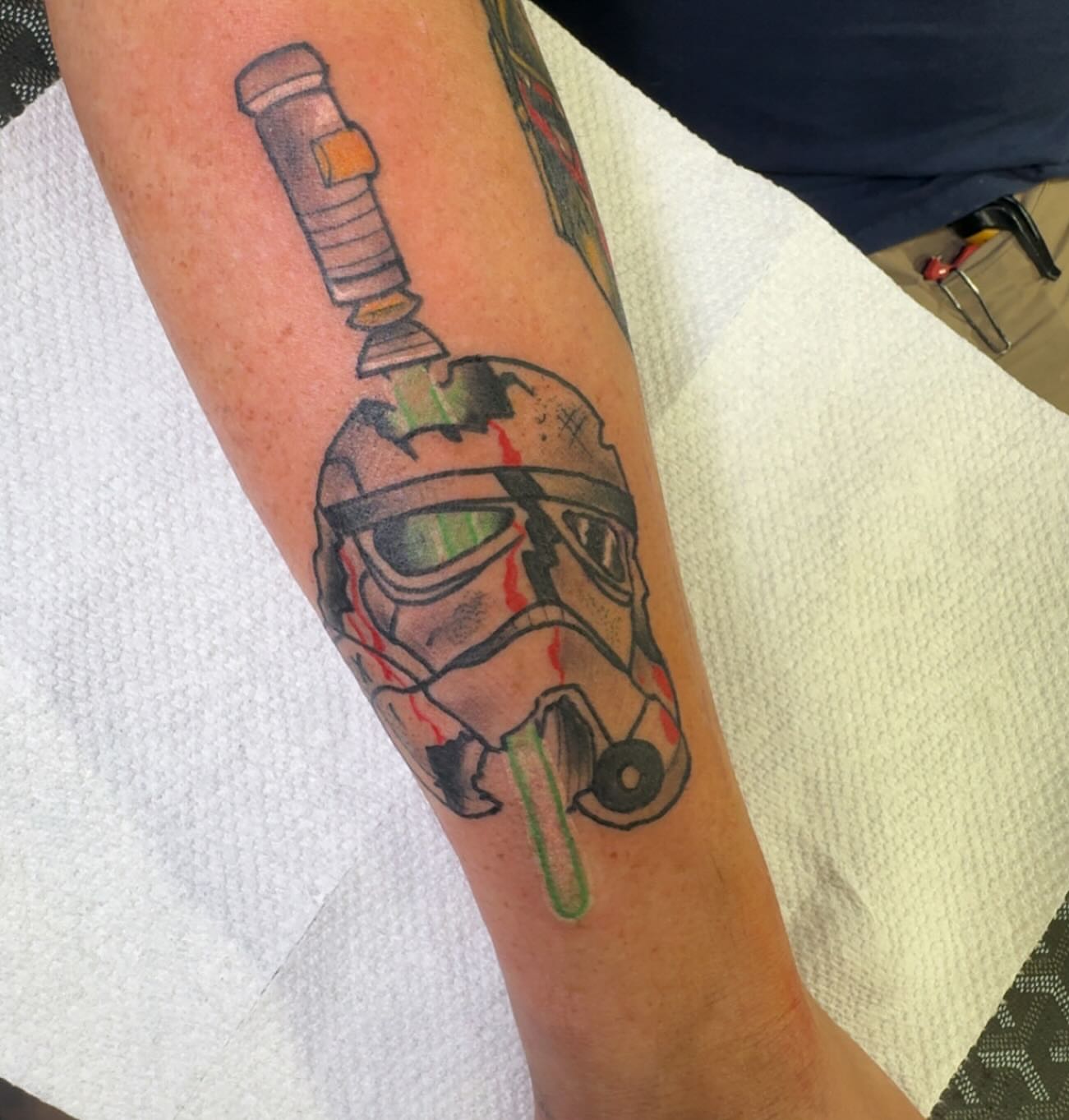 Stormtrooper helmet realism tattoo on the forearm by Robbie Roberson