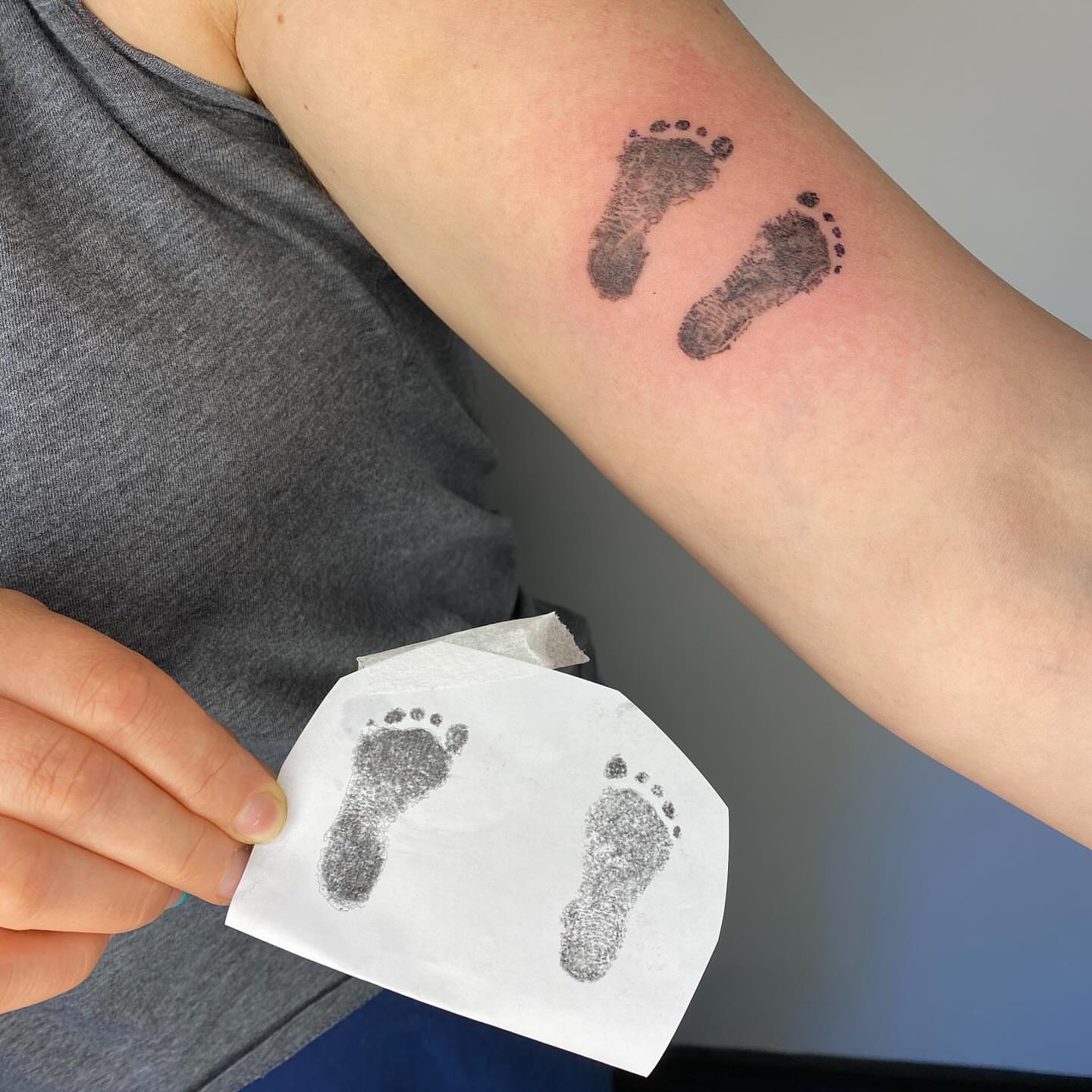 Baby footprints dotwork tattoo on the forearm by Francis Hagendorn, Toronto, Ontario