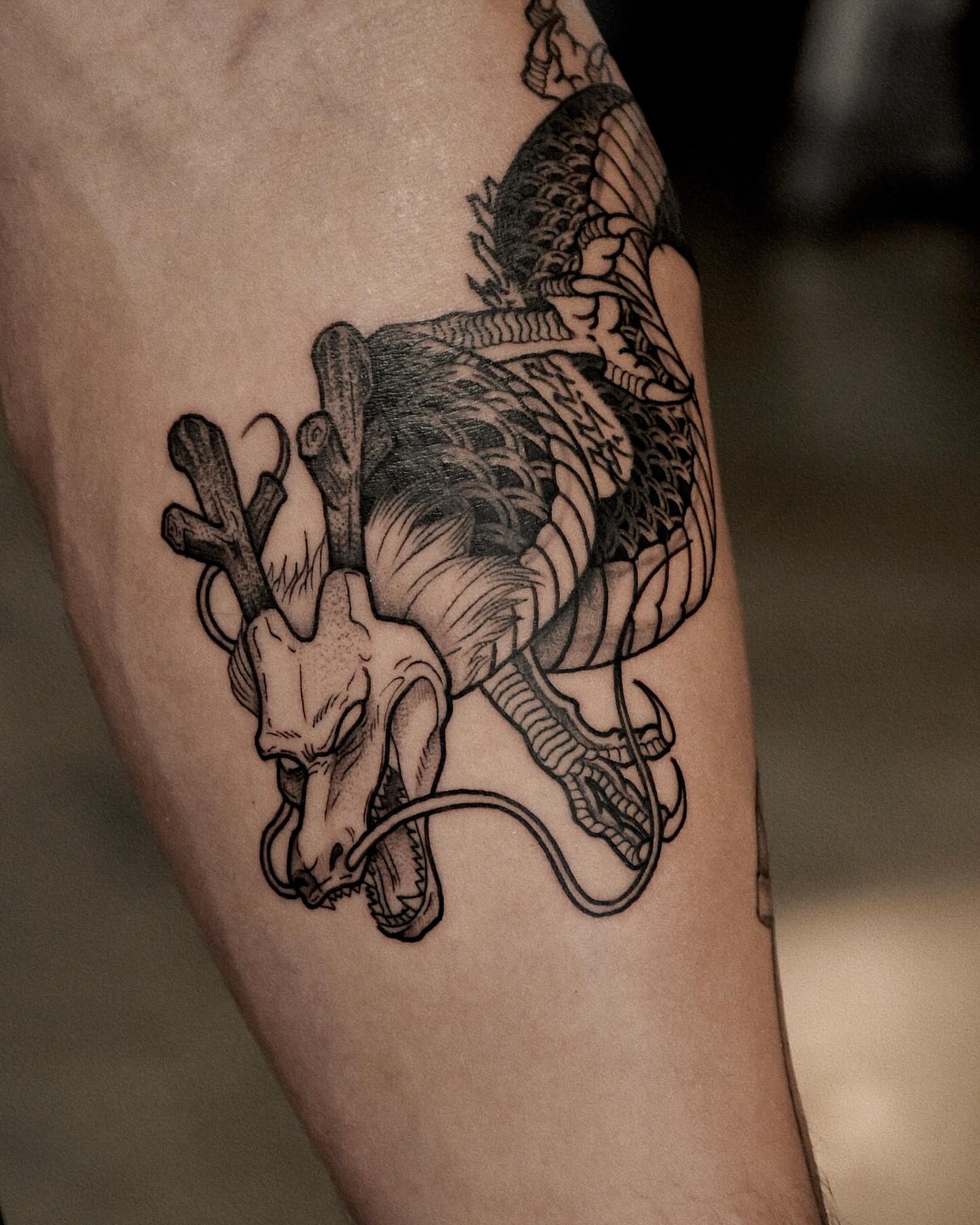 Heart and dragon realism tattoo on the forearm by Gary Zhong, Upland, California